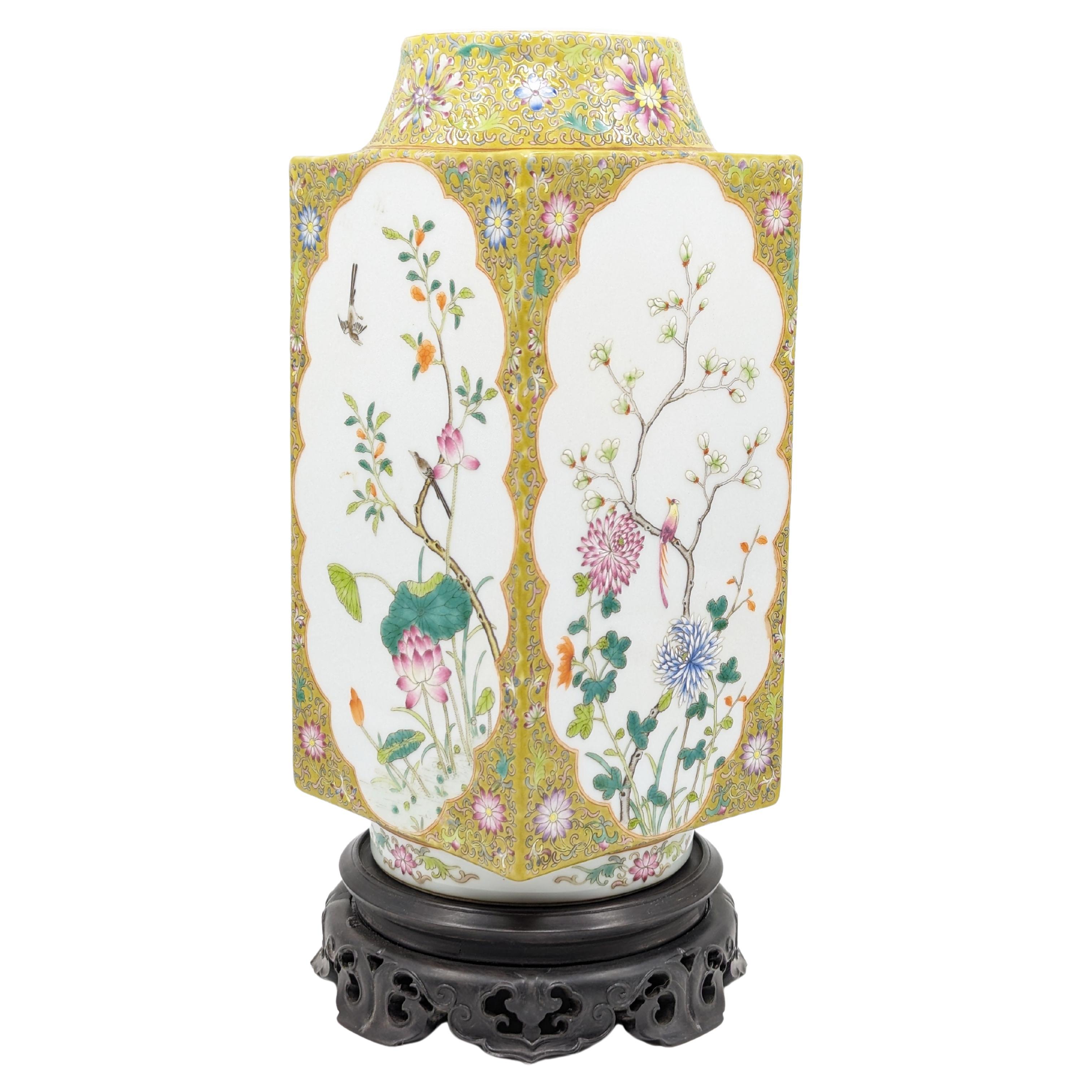Discover the rich artistry and heritage encapsulated in this early 20th century Republic period Famille Jaune vase, a splendid representation of Chinese craftsmanship during a vibrant chapter in China's artistic journey. This exquisite piece shows