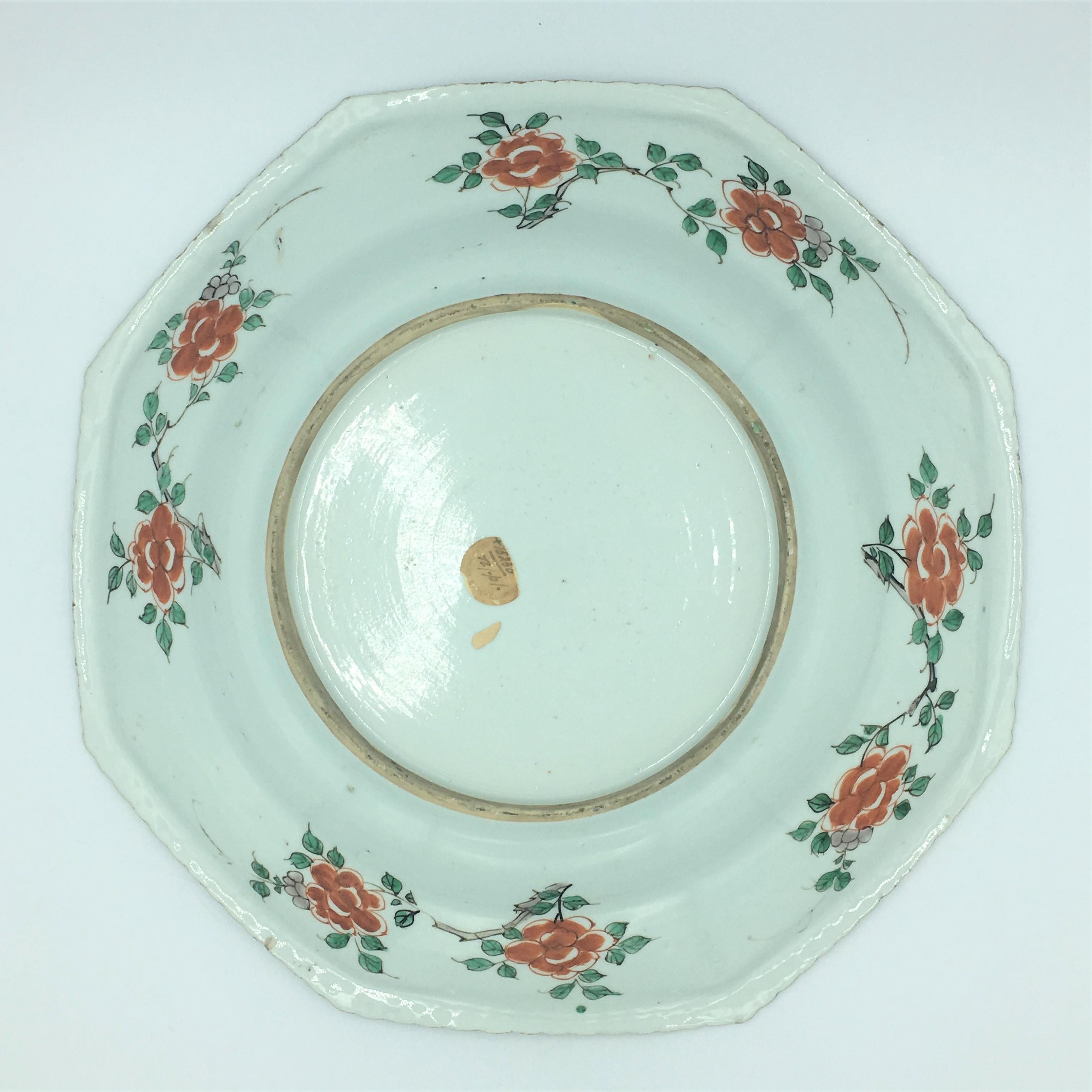 Kangxi period 1662-1722
A Chinese Kangxi period Famille Verte octagonal dish having fine enamel decoration throughout. Two courting birds in a garden, which is framed by phoenix’s and peony’s in the octagonal piecrust border. This is the smaller