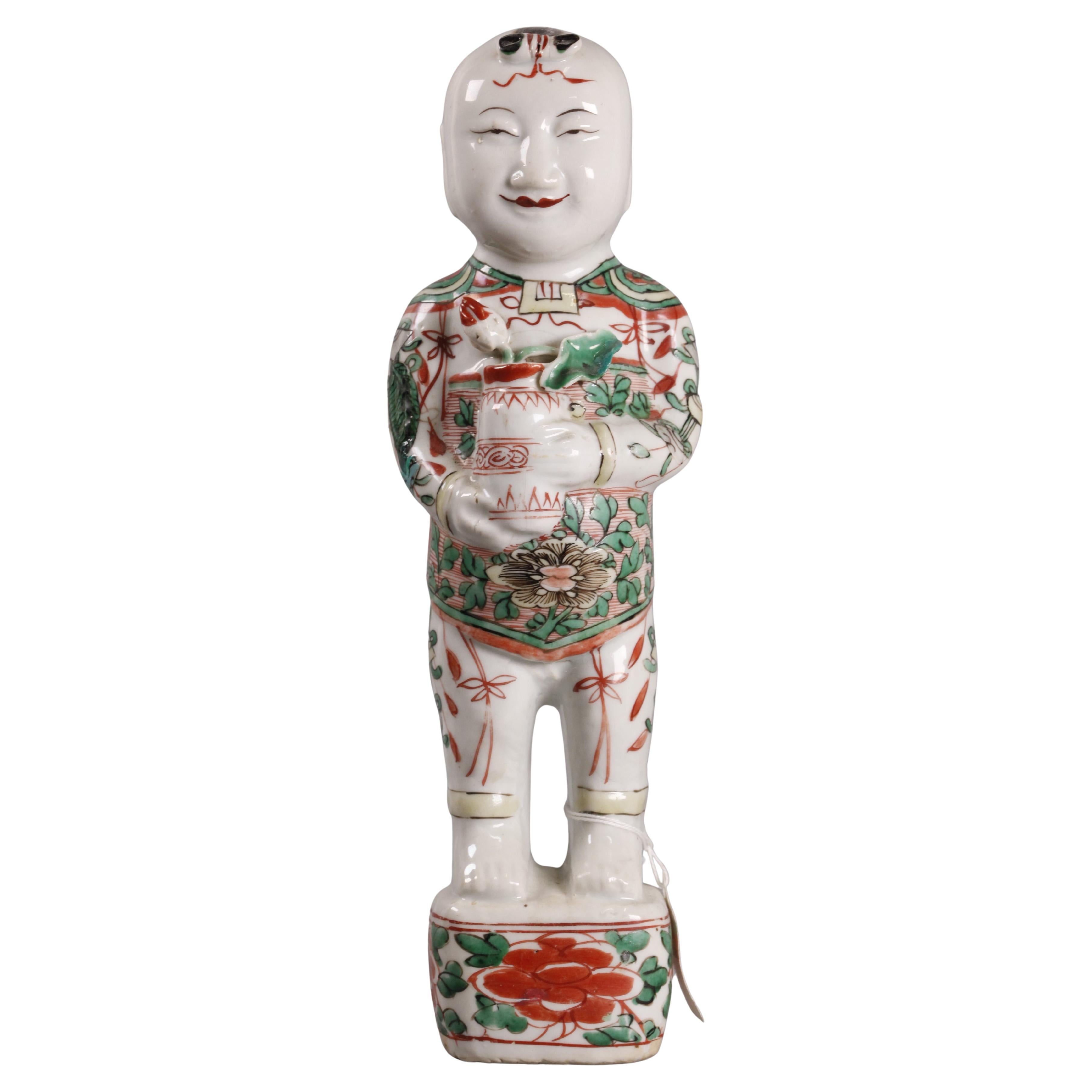Figura di ragazzo in porcellana cinese, XIX sec.