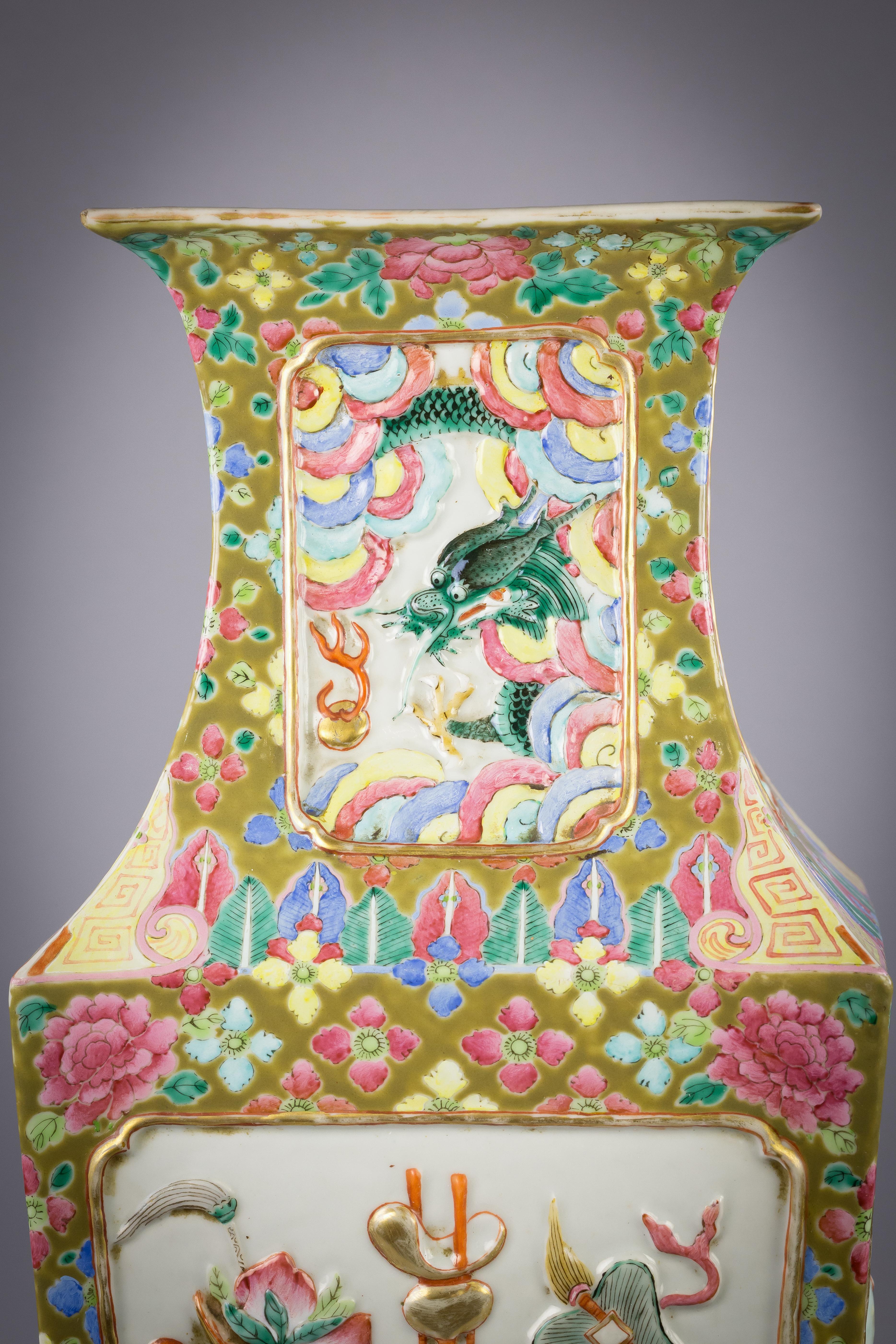 Chinese porcelain mandarin pallet vase, circa 1860

With molded emblems.