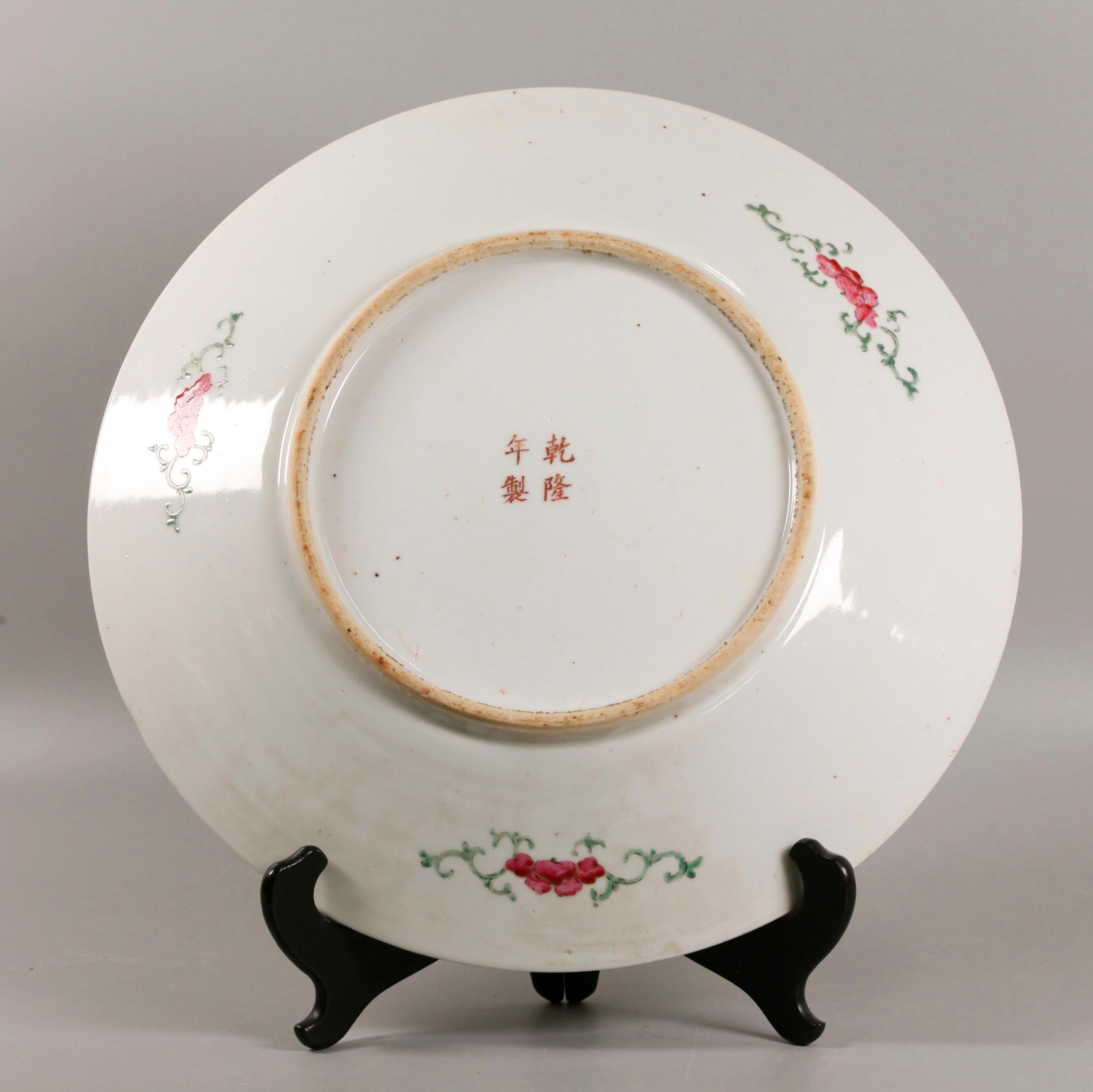 decorated with floral motif and leaf scrolls on yellow ground; wooden stand shown in pictures is not included with this item