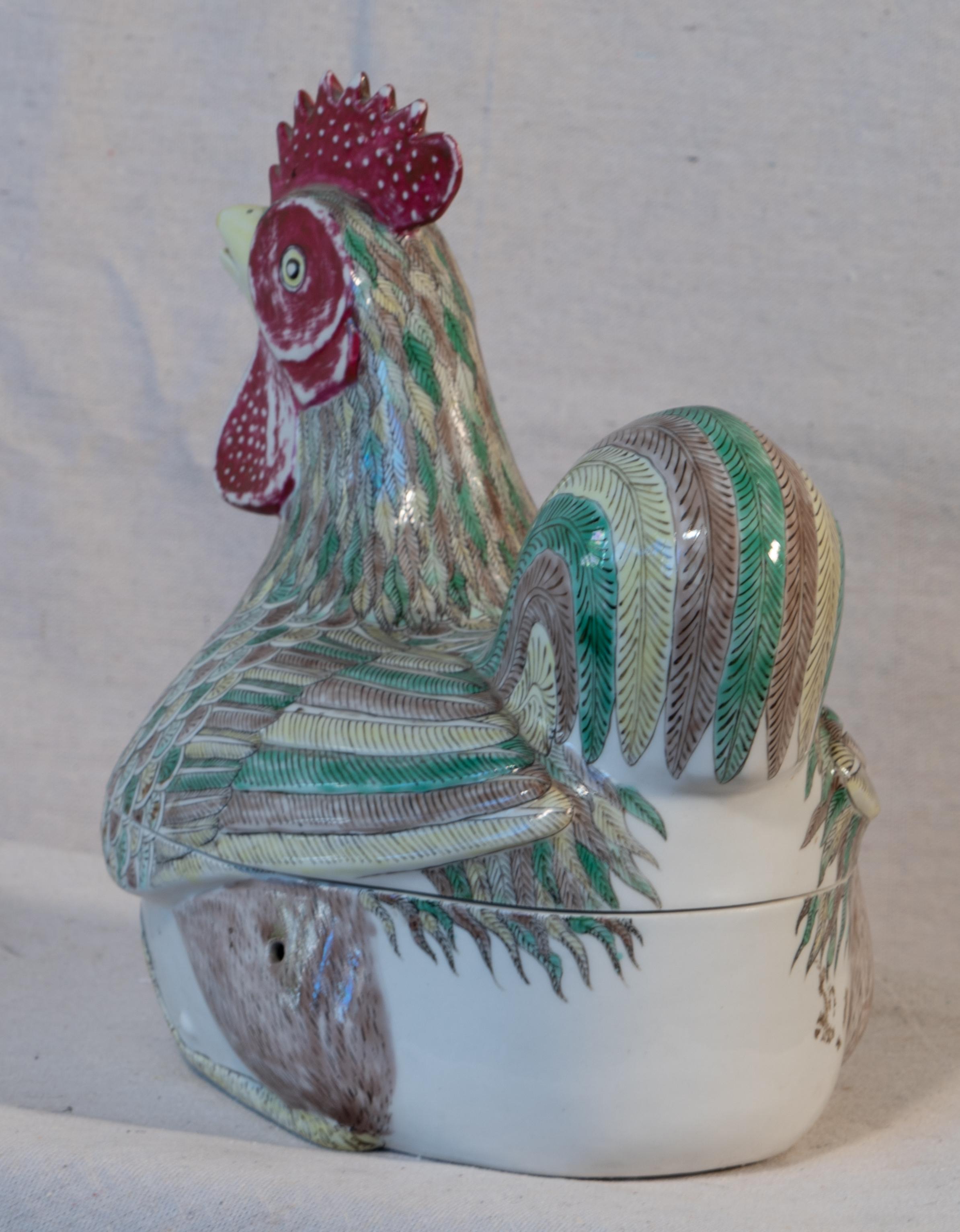 Chinese porcelain polychrome rooster form covered bowl.
Very good detail and separation of colors. Heavy porcelain body.
Mid-20th century.