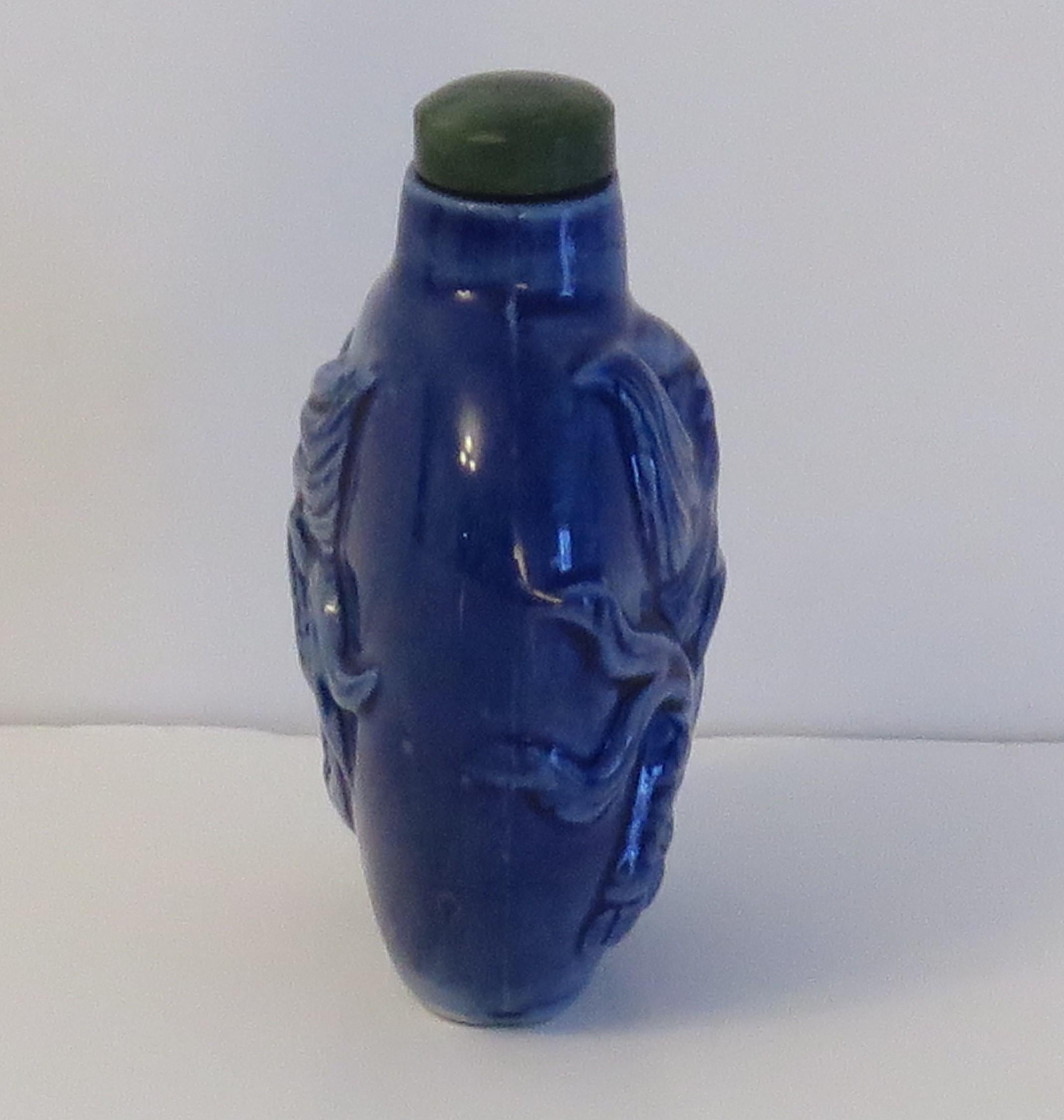 Chinese Export Chinese Porcelain Snuff Bottle moulded dragon stone top with spoon, Circa 1930s