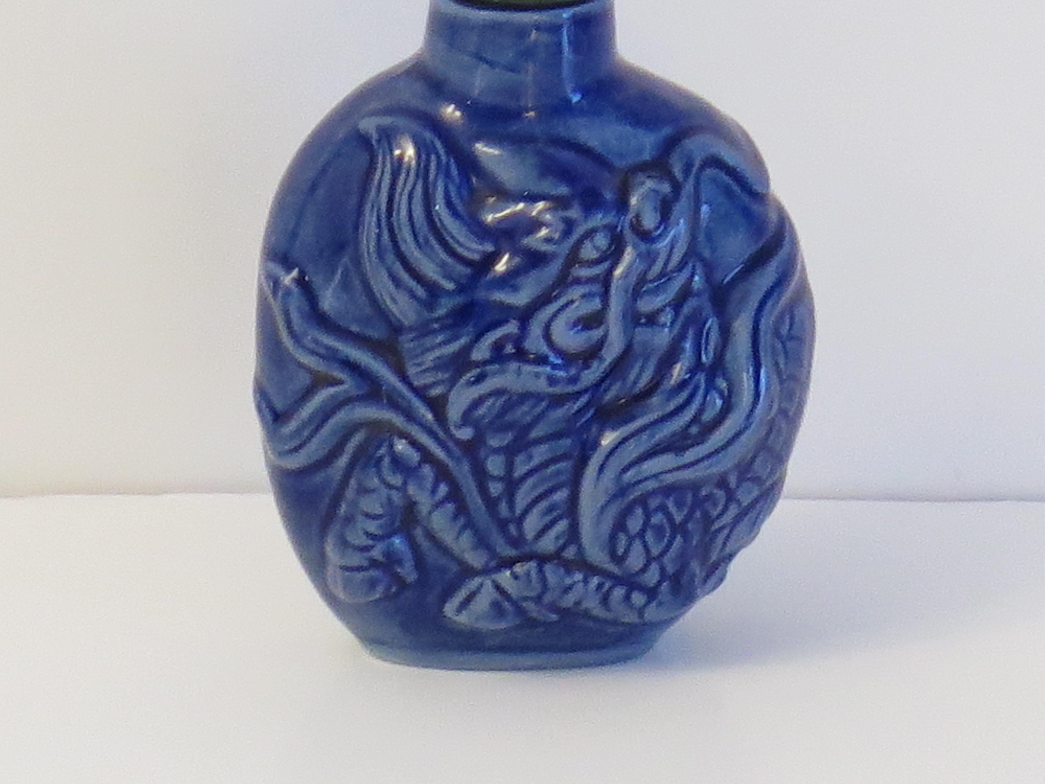 Hand-Painted Chinese Porcelain Snuff Bottle moulded dragon stone top with spoon, Circa 1930s