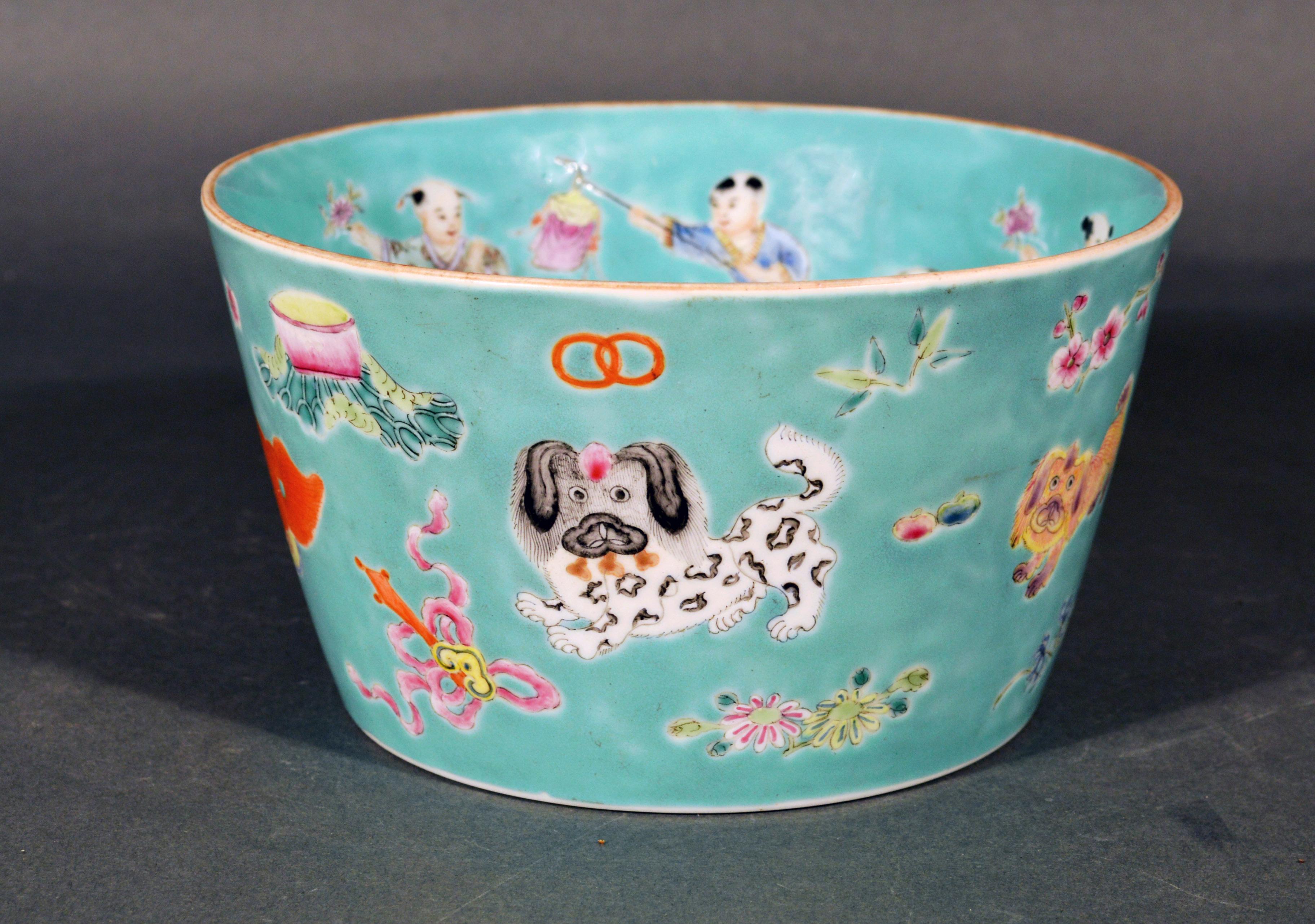 Chinese porcelain turquoise jardinière of bowl with Chinese Boys & Pekingese Dog
Mid-19th century
(Ref: NY9418B-Nrrr)

The circular straight-sided aqua-colored bowl or jardinière with a slightly flaring side is painted with Chinese Dogs on the