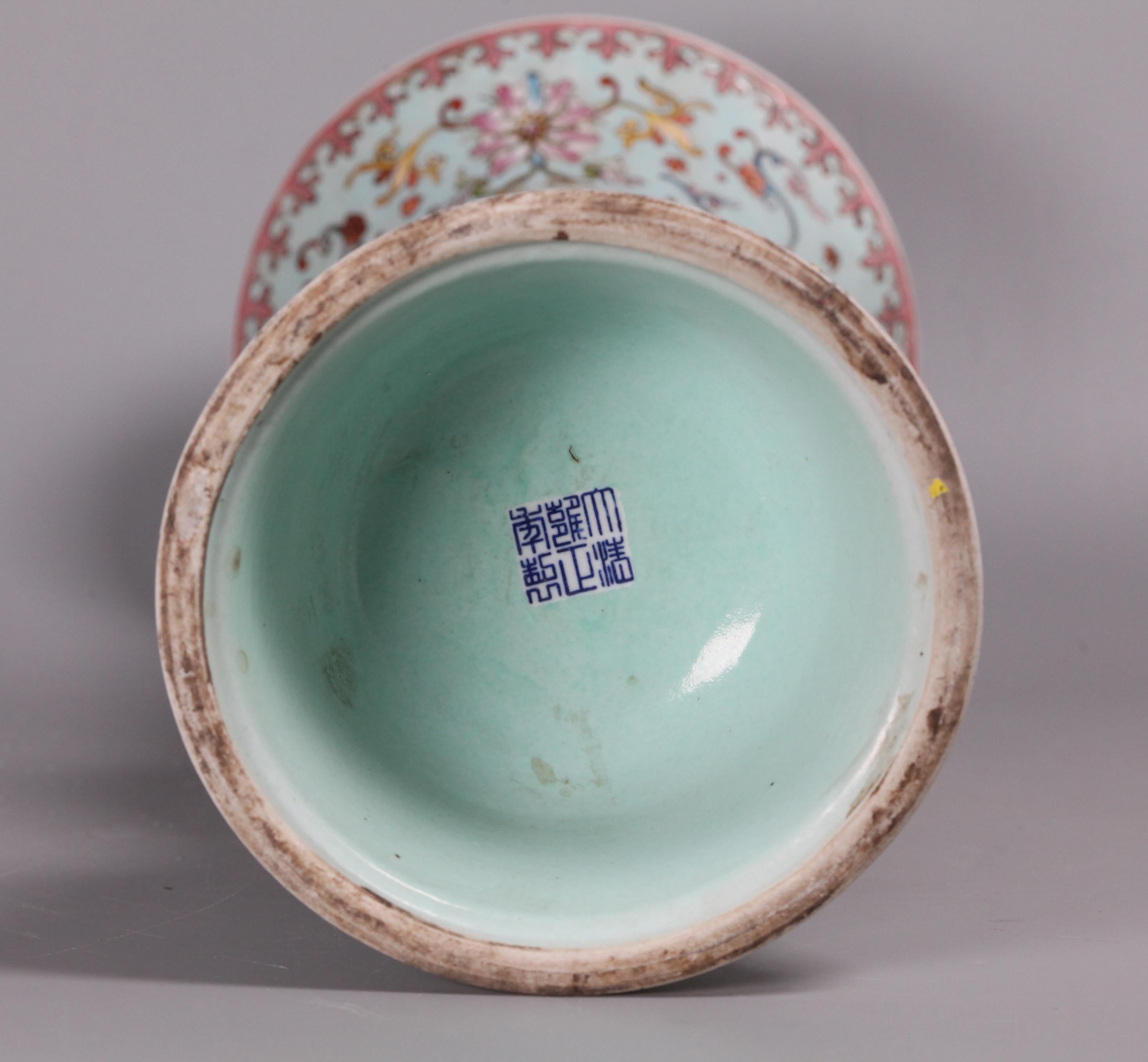 floral motif on powder blue ground beaker vase 