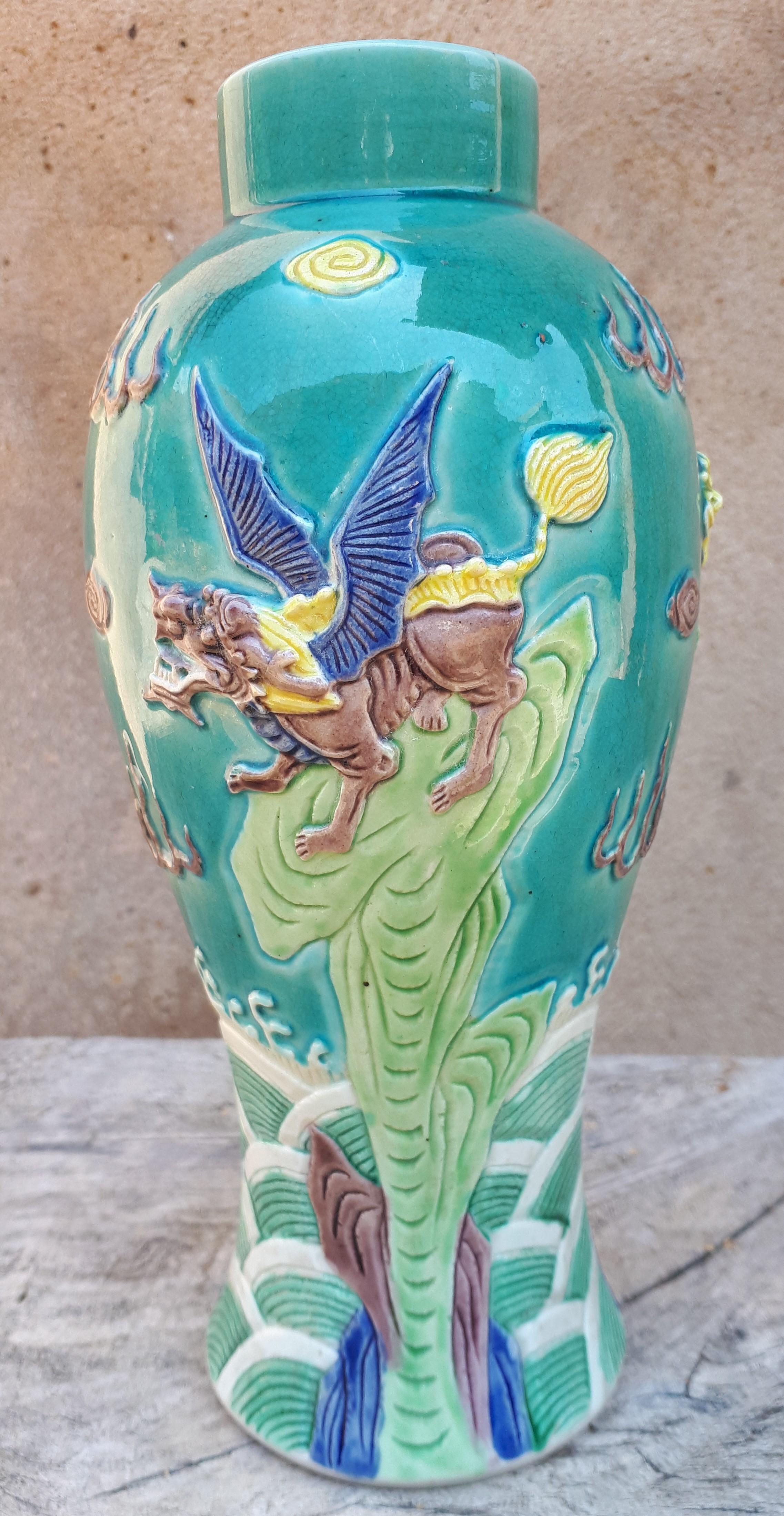 Rare porcelain vase with polychrome decoration of chimeras standing on a rock above the waves.
Four-character mark under the base : 
