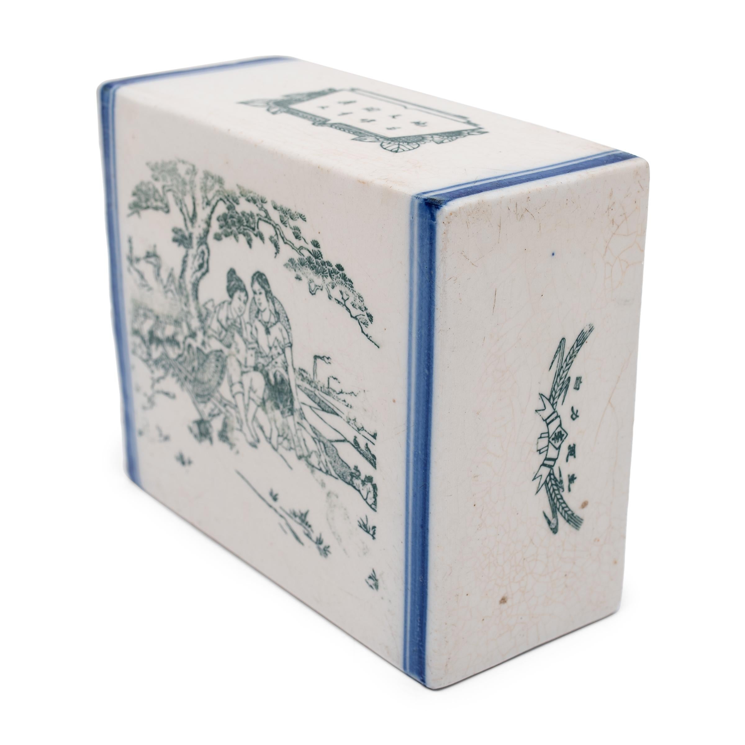 This square ceramic block is actually a form of Chinese headrest or neck pillow. Popular during the Qing dynasty, rigid headrests such as this were used by upper-class women to protect their elaborate hairstyles by elevating the head during slumber.