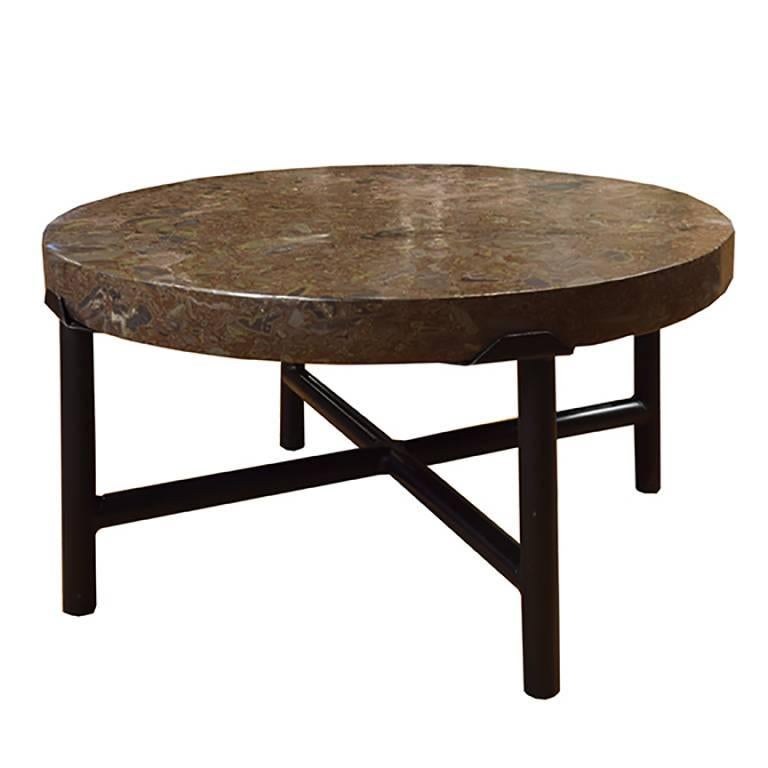 This table’s beautifully modeled top is made from puddingstone, a conglomerate material named for its intriguing patterning. Historically, this type of stone was favored by artists and calligraphers as an ideal tabletop surface on which to place