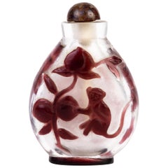 Chinese Purple Overlay Peking Glass Snuff Bottle