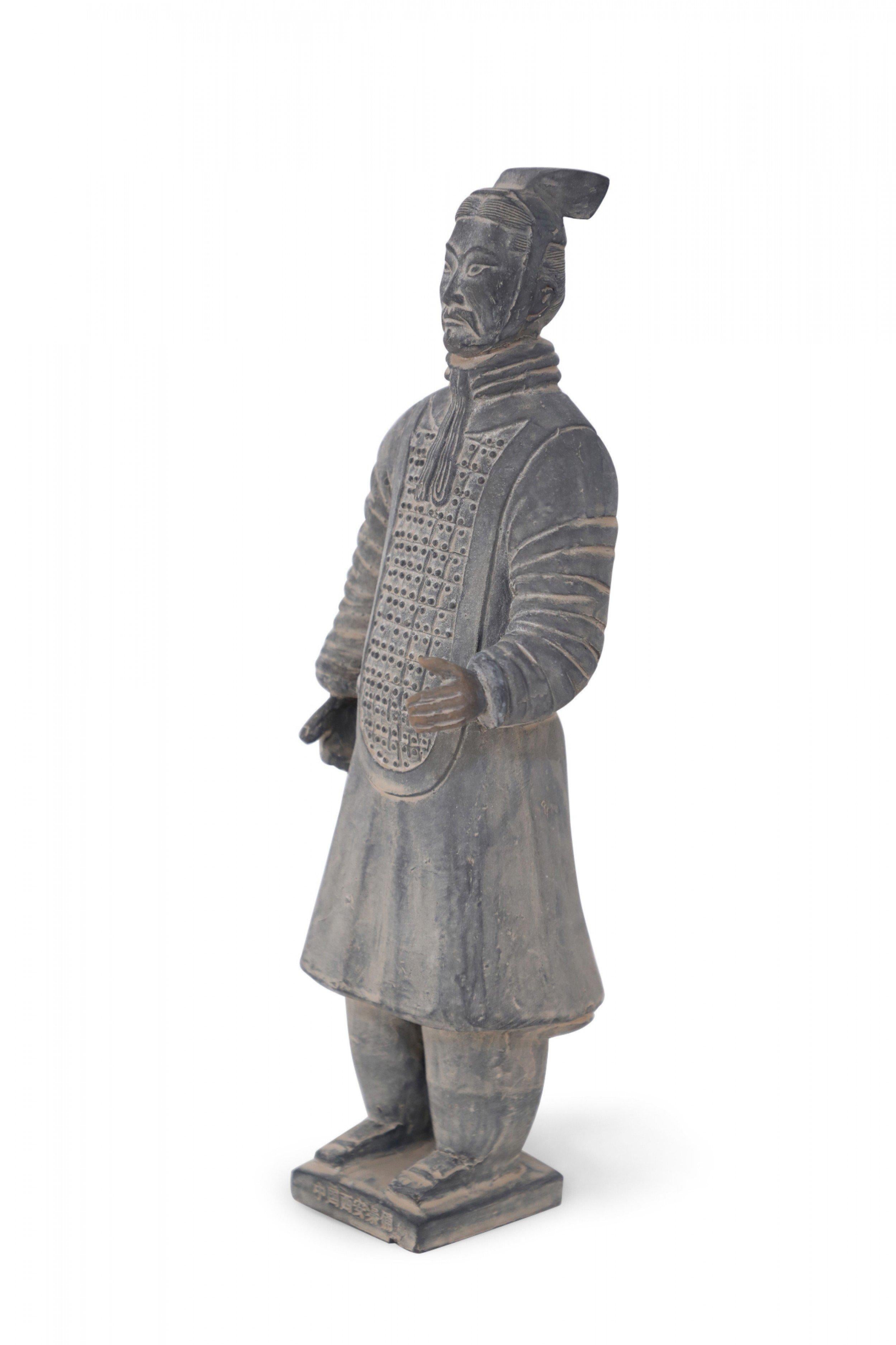 Antique Chinese terracotta warrior figure modeled after one of the 7,000 warriors that form the Terracotta Army in the Mausoleum of the First Qin Emperor, Shi Huang.
 