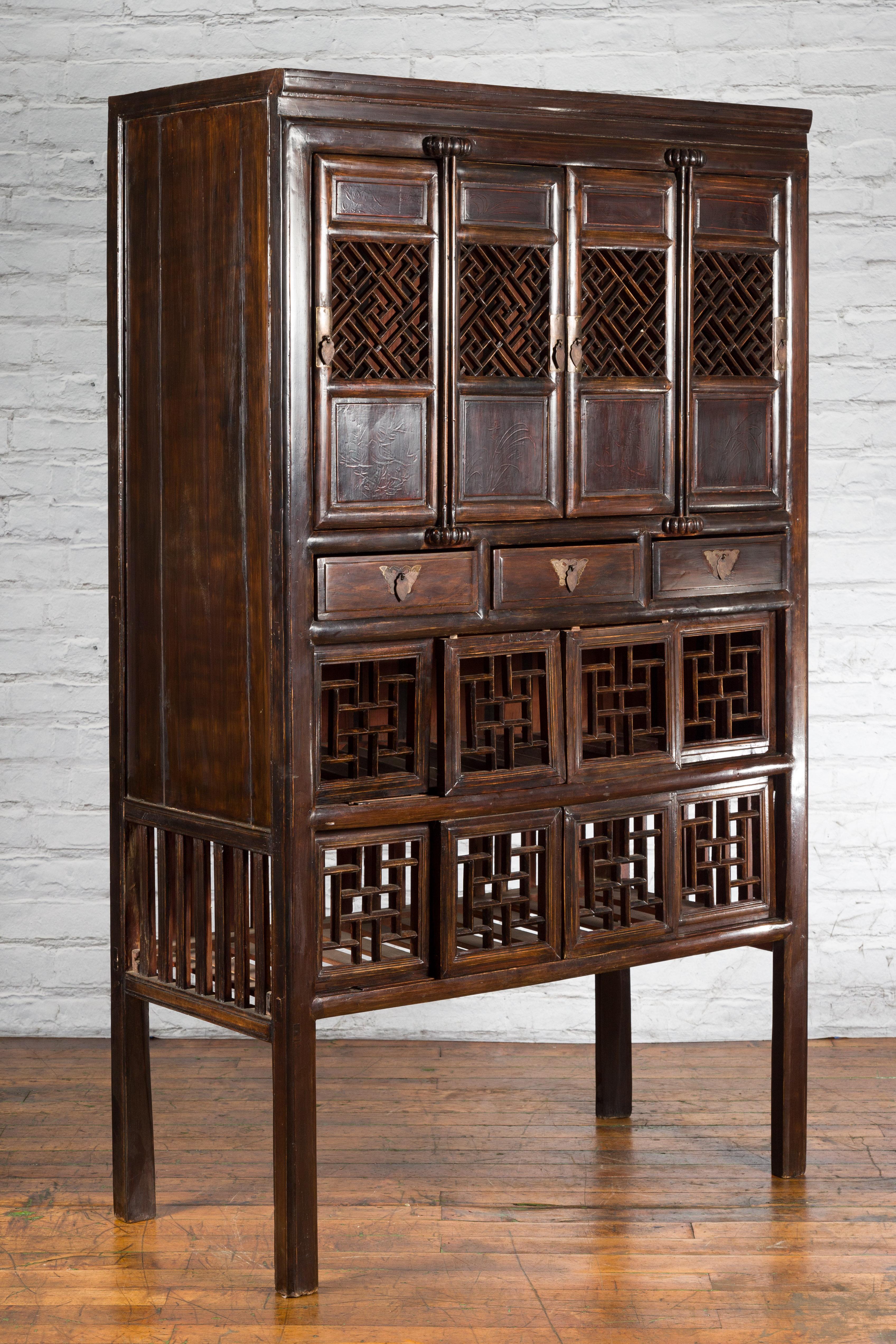 Lacquered Chinese Qing 19th Century Brown Cabinet with Fretwork Doors and Three Drawers For Sale