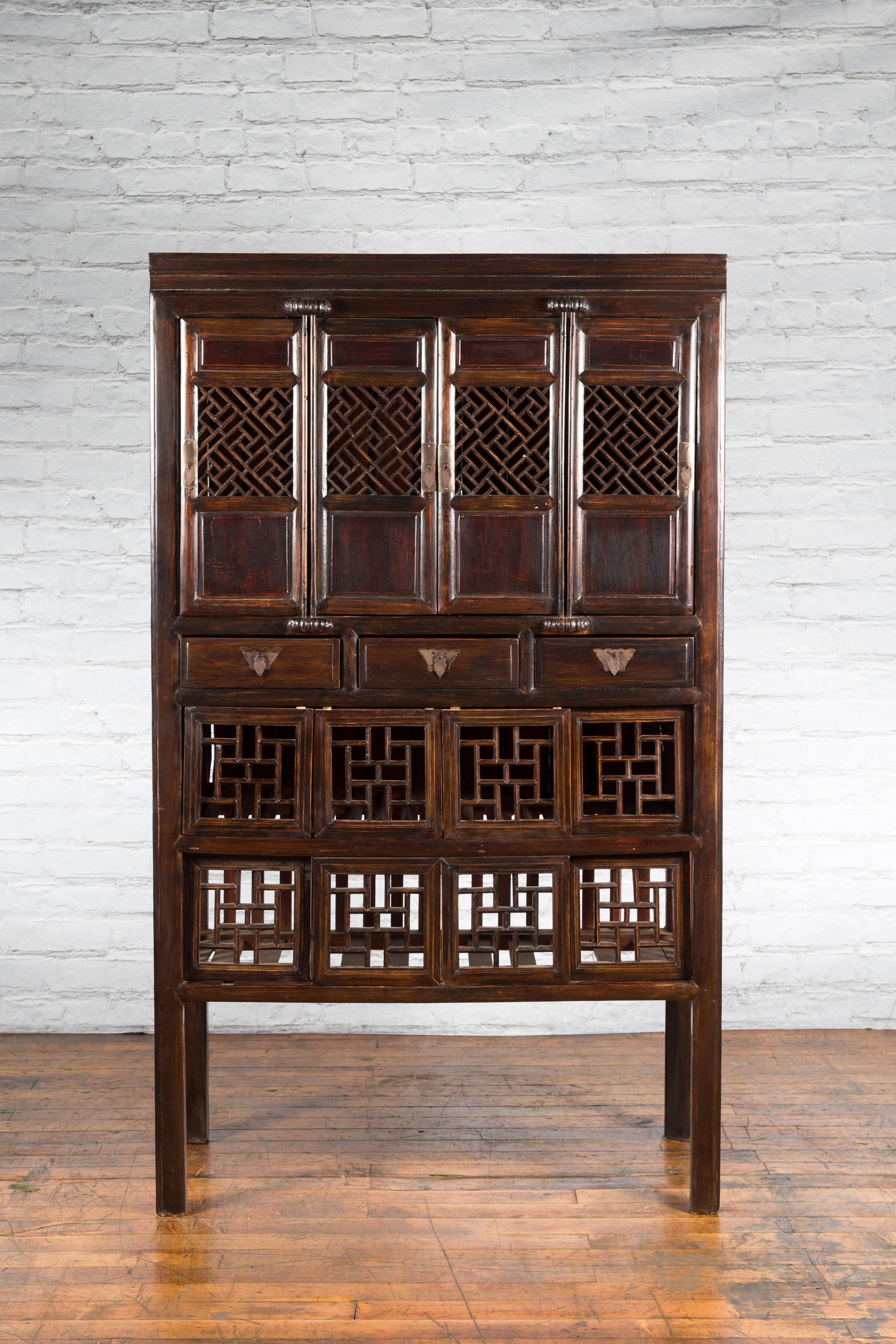 Wood Chinese Qing 19th Century Brown Cabinet with Fretwork Doors and Three Drawers For Sale