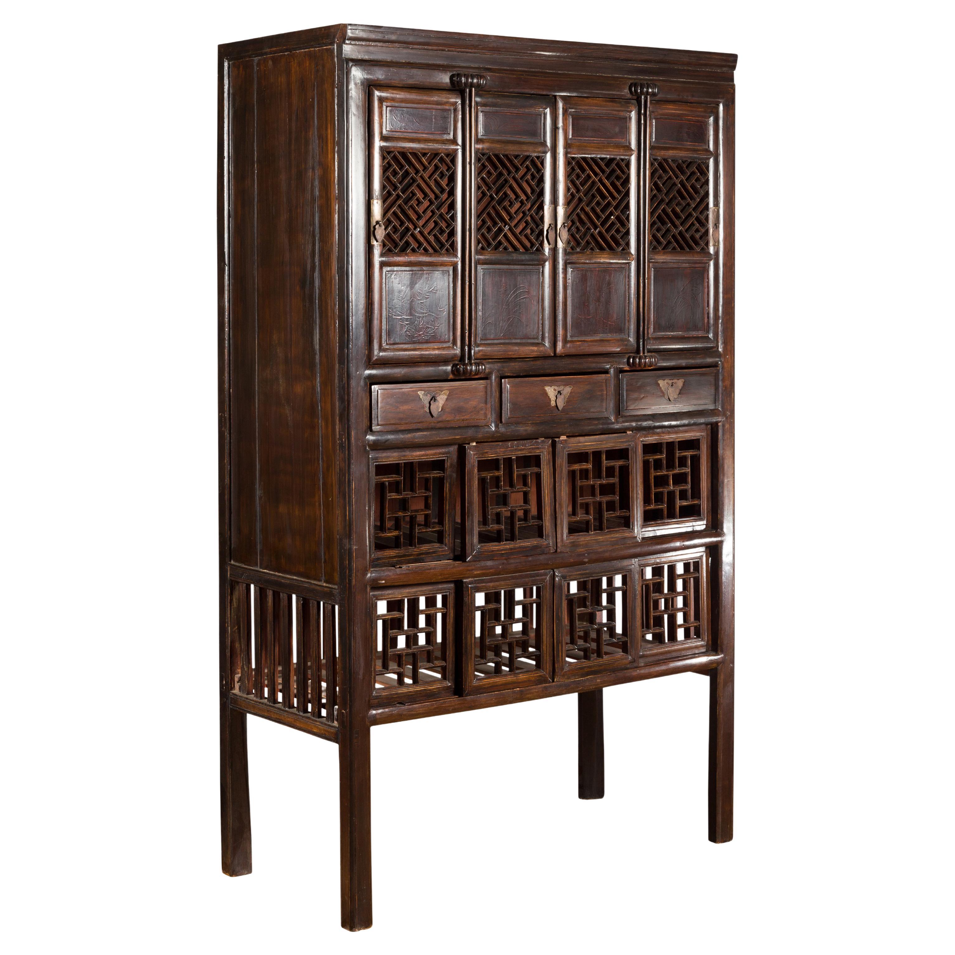 Chinese Qing 19th Century Brown Cabinet with Fretwork Doors and Three Drawers