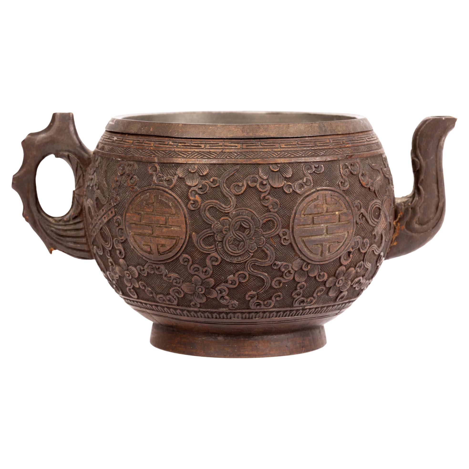 Chinese Qing Carved Coconut Teapot with Shou Emblems & Precious Objects