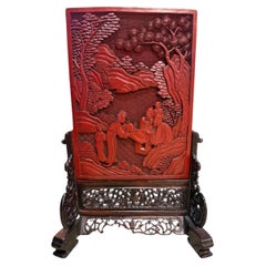 Chinese Qing Cinnabar Lacquer Carved Table Screen with Rosewood Openwork Stand