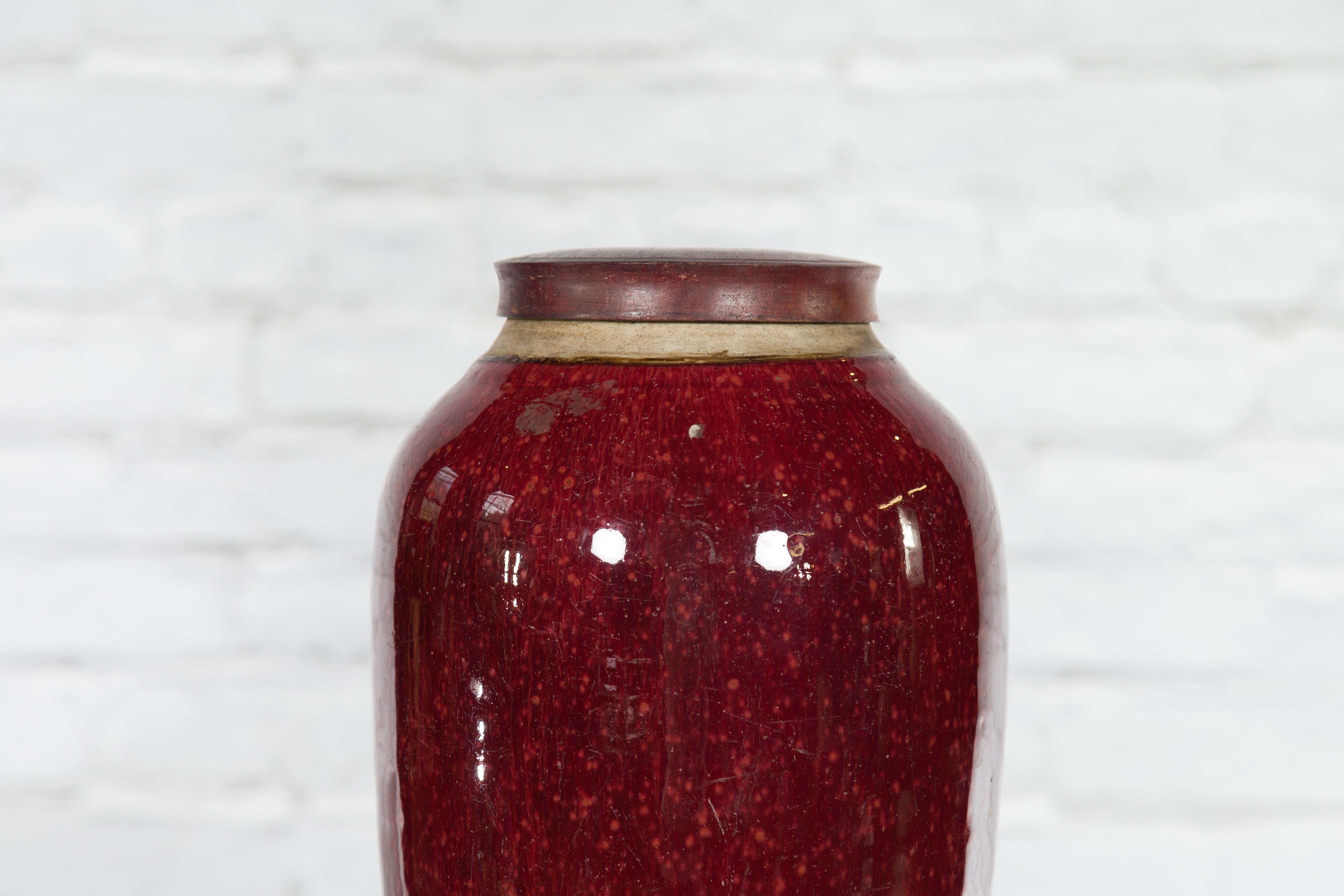 Ceramic Chinese Qing Dynasty 18th or 19th Century Oxblood Jar with Circular Lid For Sale