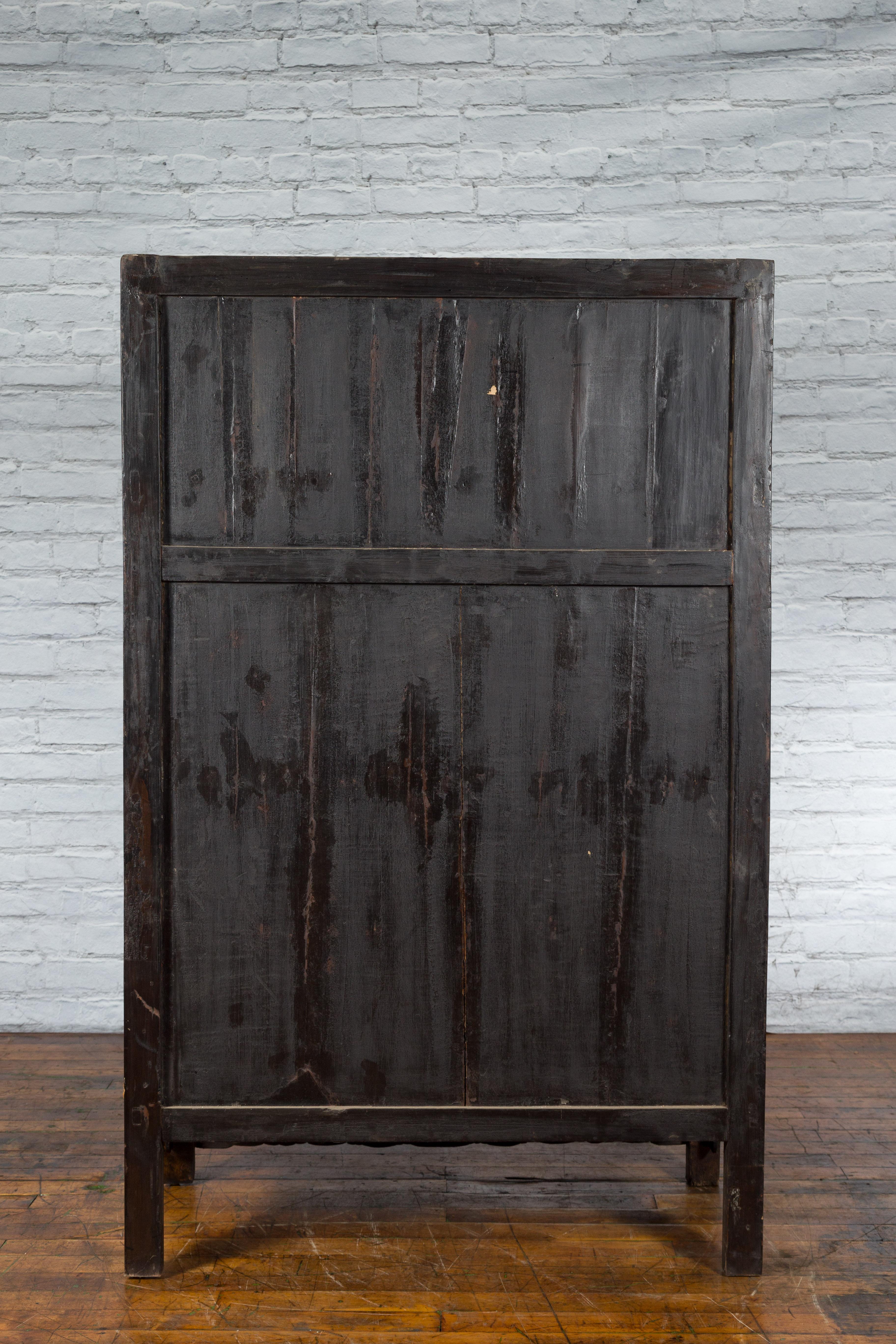 Chinese Qing Dynasty 19th Century Armoire with Carved Skirt, Doors and Drawers For Sale 11