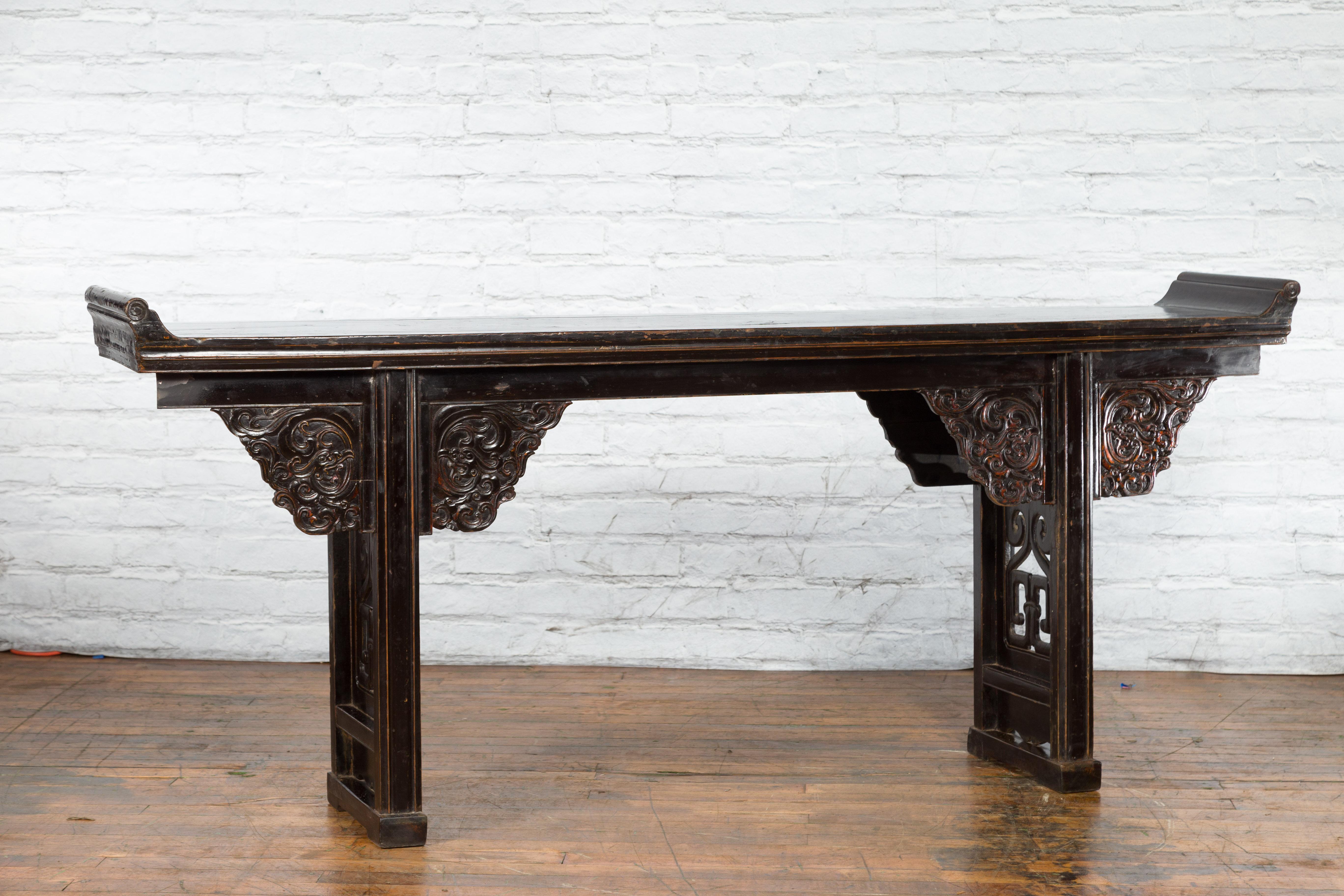 Wood Chinese Qing Dynasty 19th Century Black Console Table with Carved Dragon Motifs For Sale