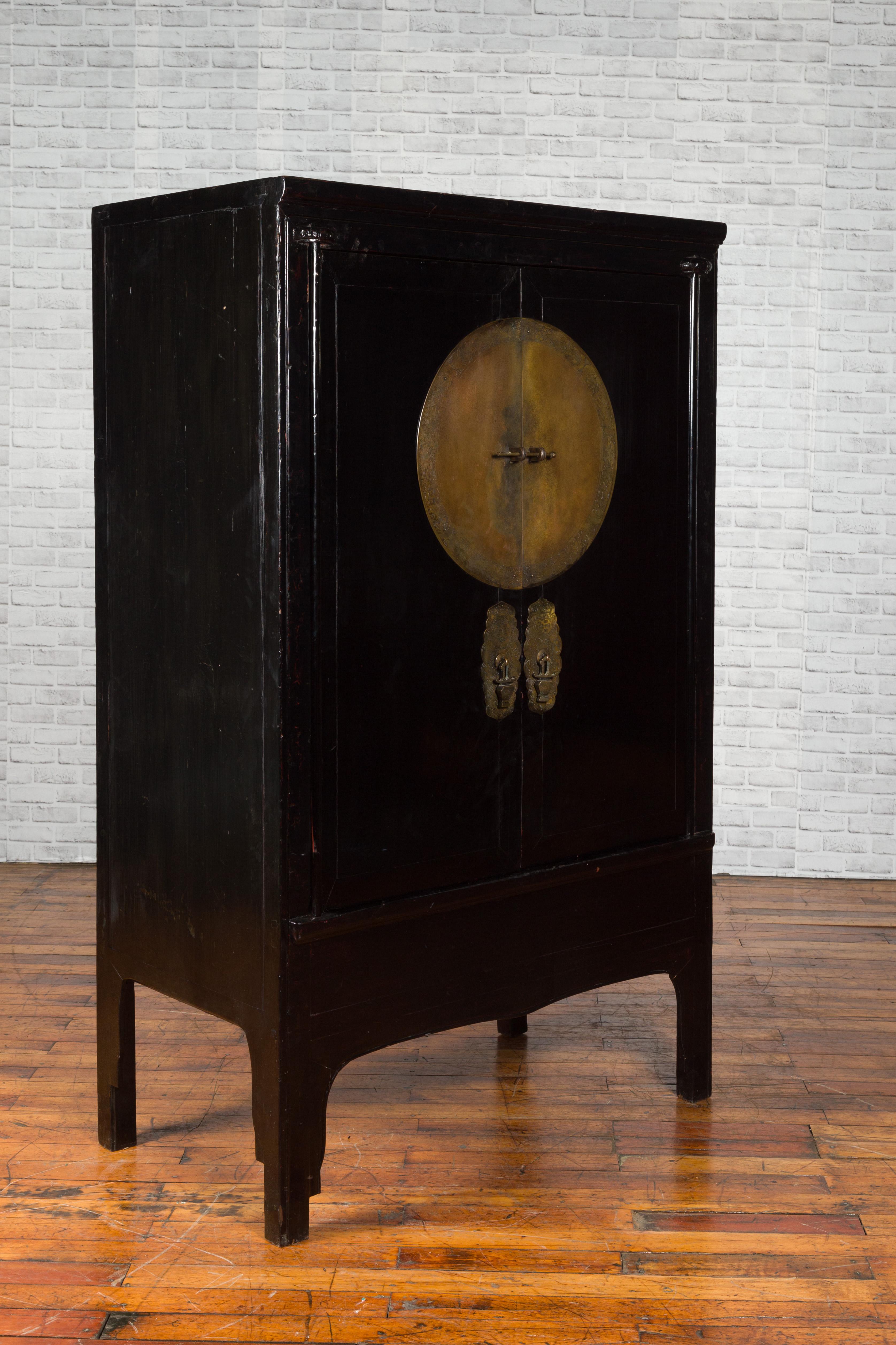 Lacquered Chinese Qing Dynasty 19th Century Black Lacquer Cabinet with Large Medallion