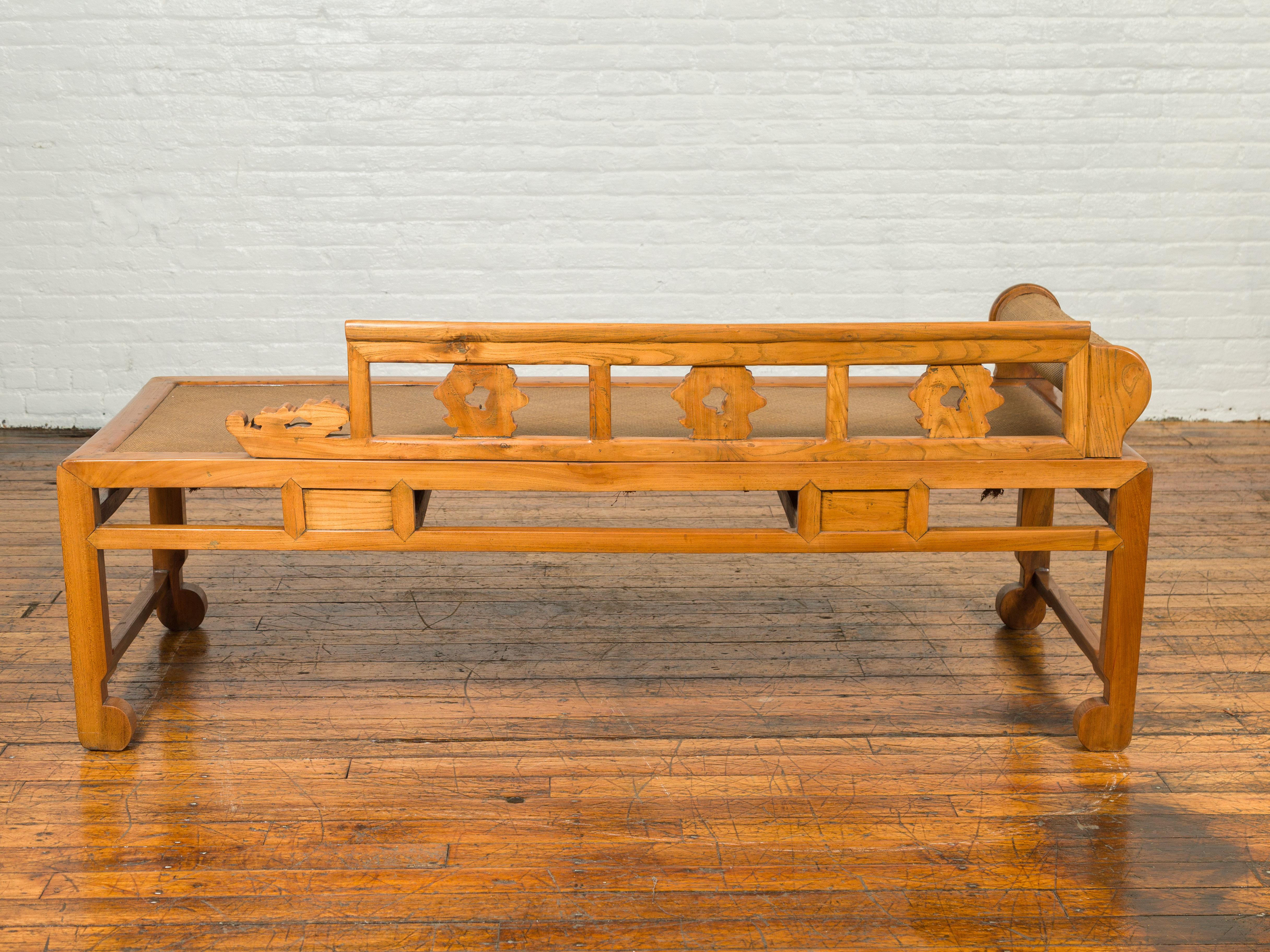 Chinese Qing Dynasty 19th Century Carved Wooden Opium Daybed with Rattan Inset For Sale