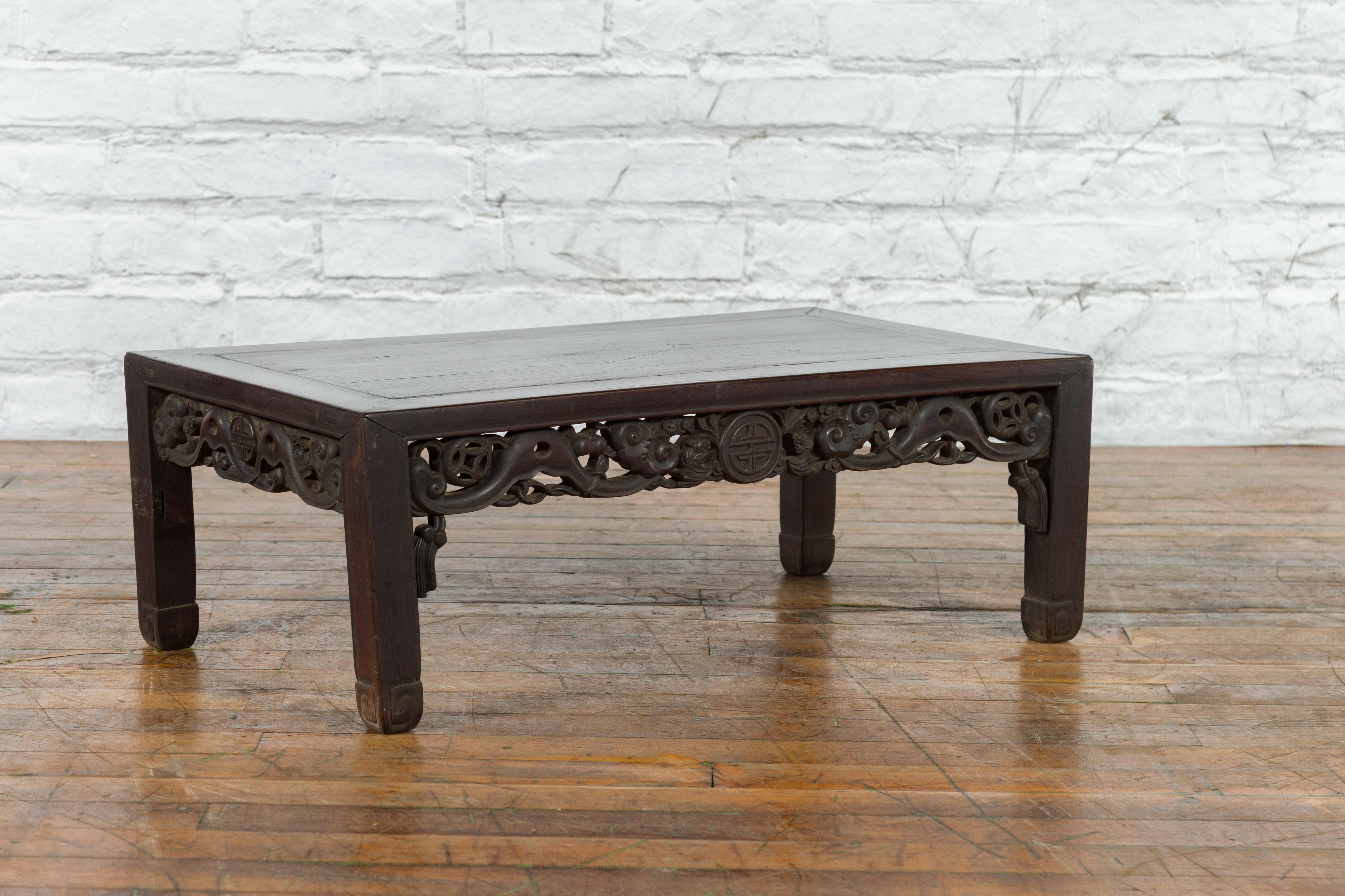 Wood Chinese Qing Dynasty 19th Century Coffee Table with Carved Apron and Dark Patina For Sale