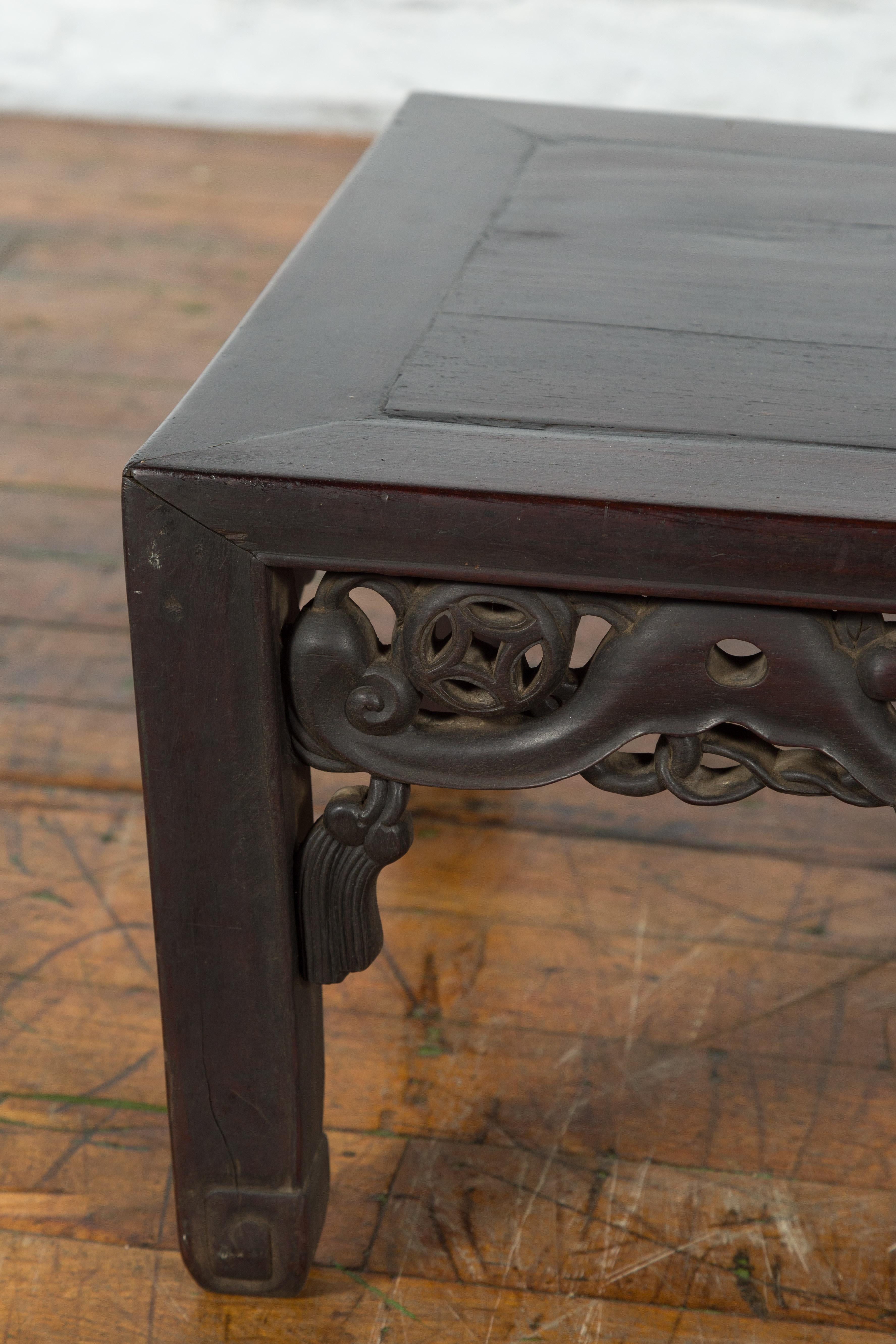 Chinese Qing Dynasty 19th Century Coffee Table with Carved Apron and Dark Patina For Sale 1