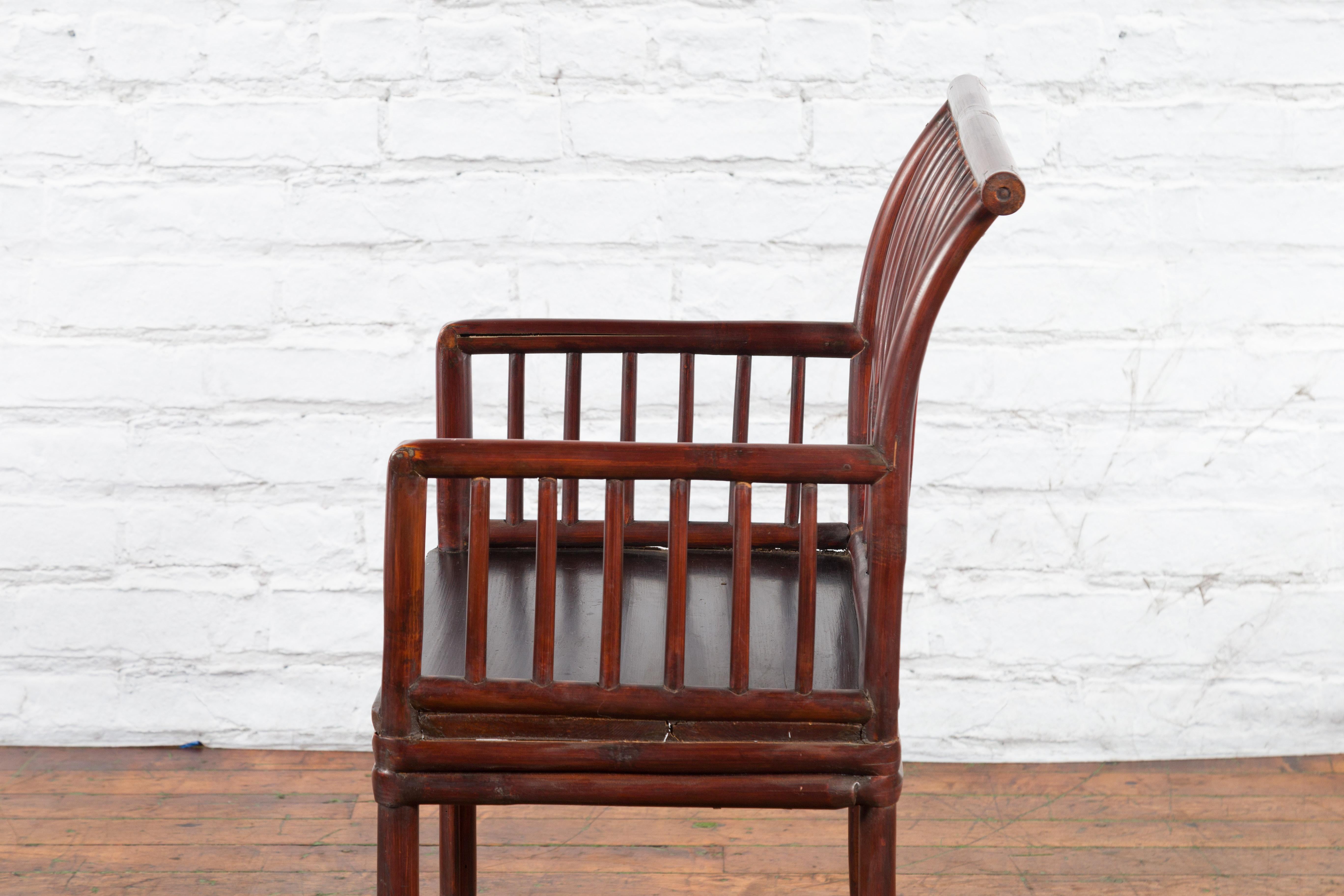 Chinese Qing Dynasty 19th Century Curved Stickback Dark Brown Lacquered Armchair For Sale 6