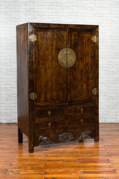 19th Century Qing Dynasty Elm Brown Cabinet with Brass Hardware and Carved Apron