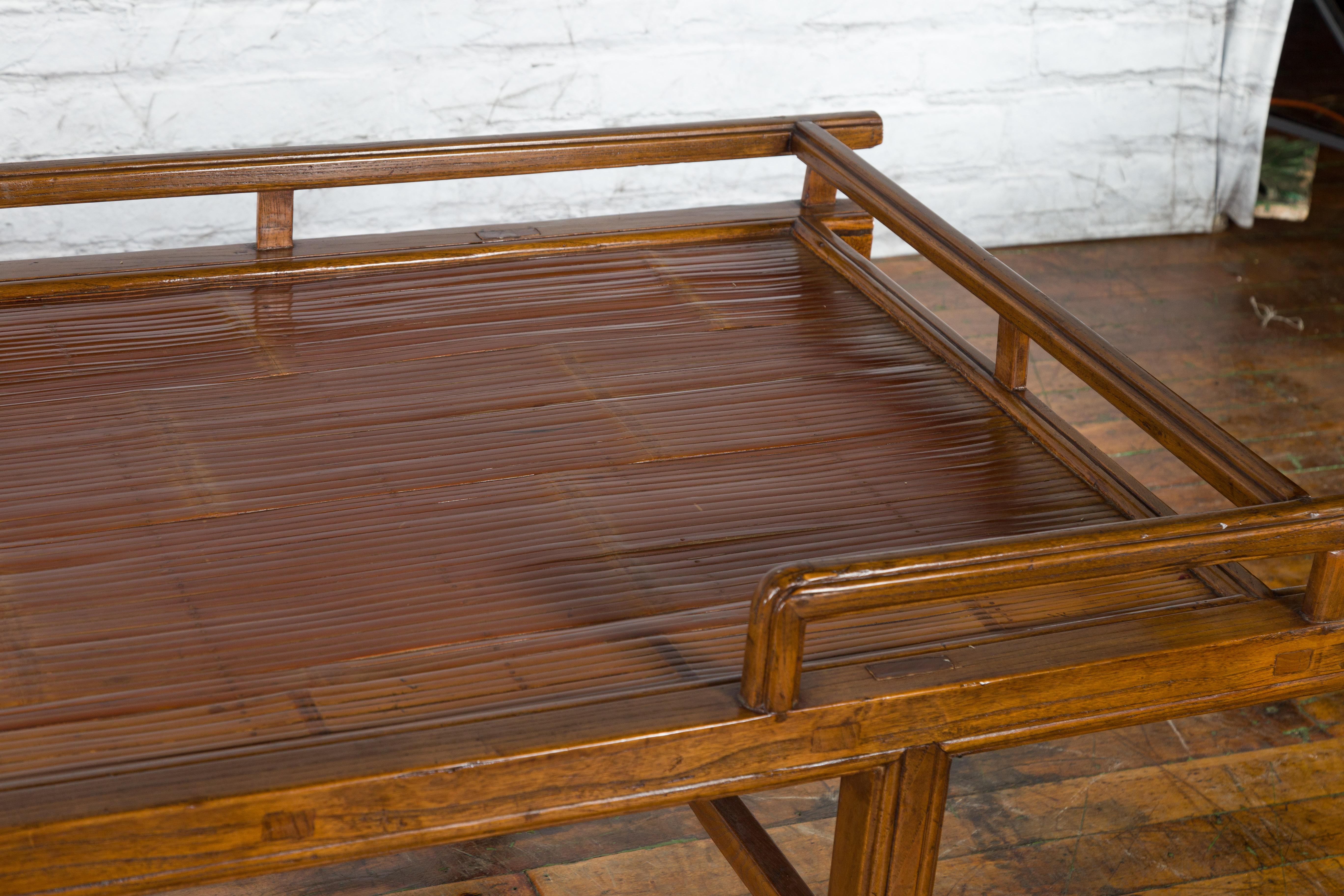 Chinese Qing Dynasty 19th Century Elm Daybed with Bamboo Seat and Guardian Lions For Sale 6