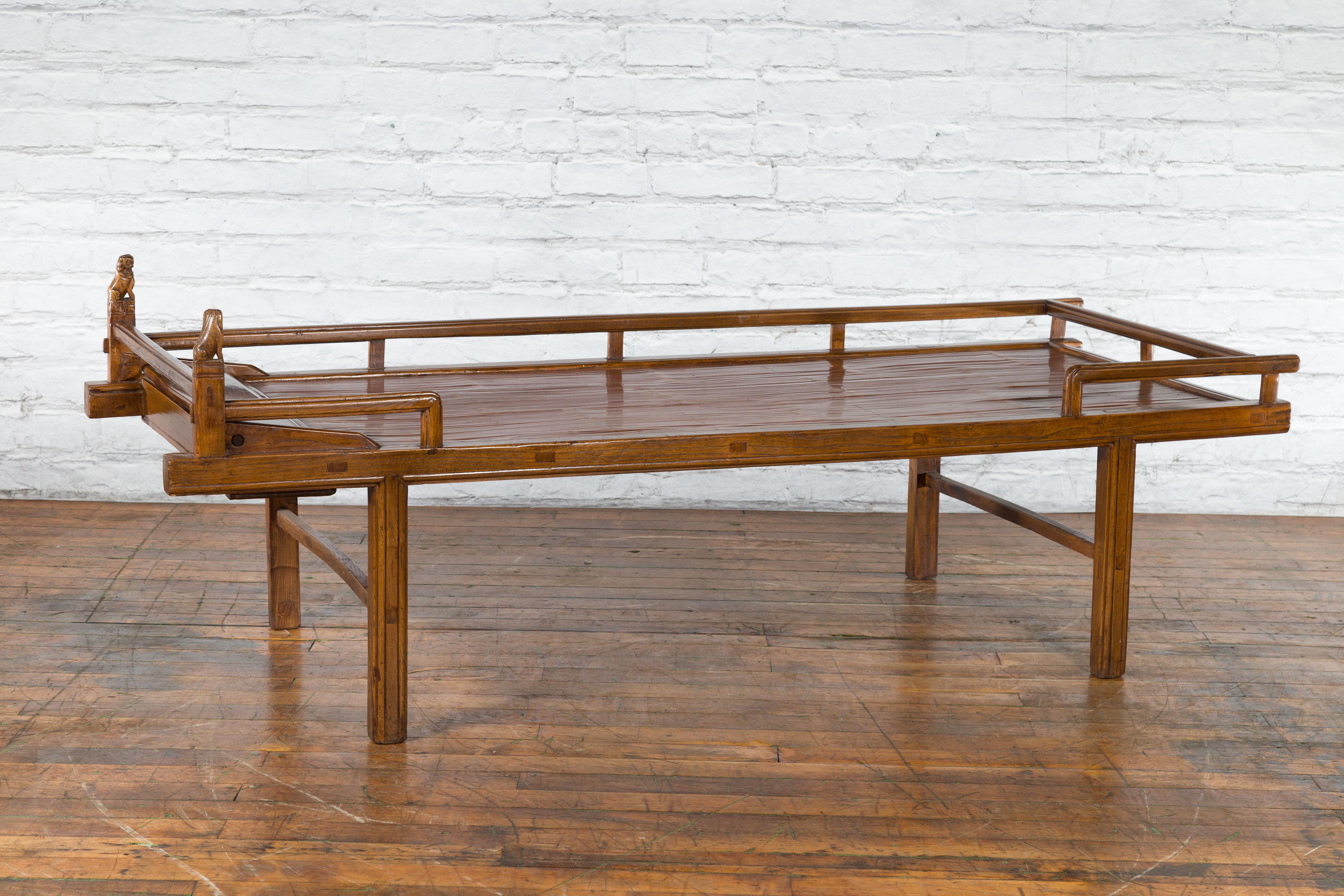 Chinese Qing Dynasty 19th Century Elm Daybed with Bamboo Seat and Guardian Lions For Sale 9