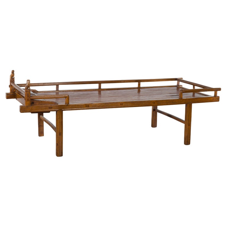 Chinese Qing Dynasty 19th Century Elm Daybed with Bamboo Seat and Guardian Lions For Sale