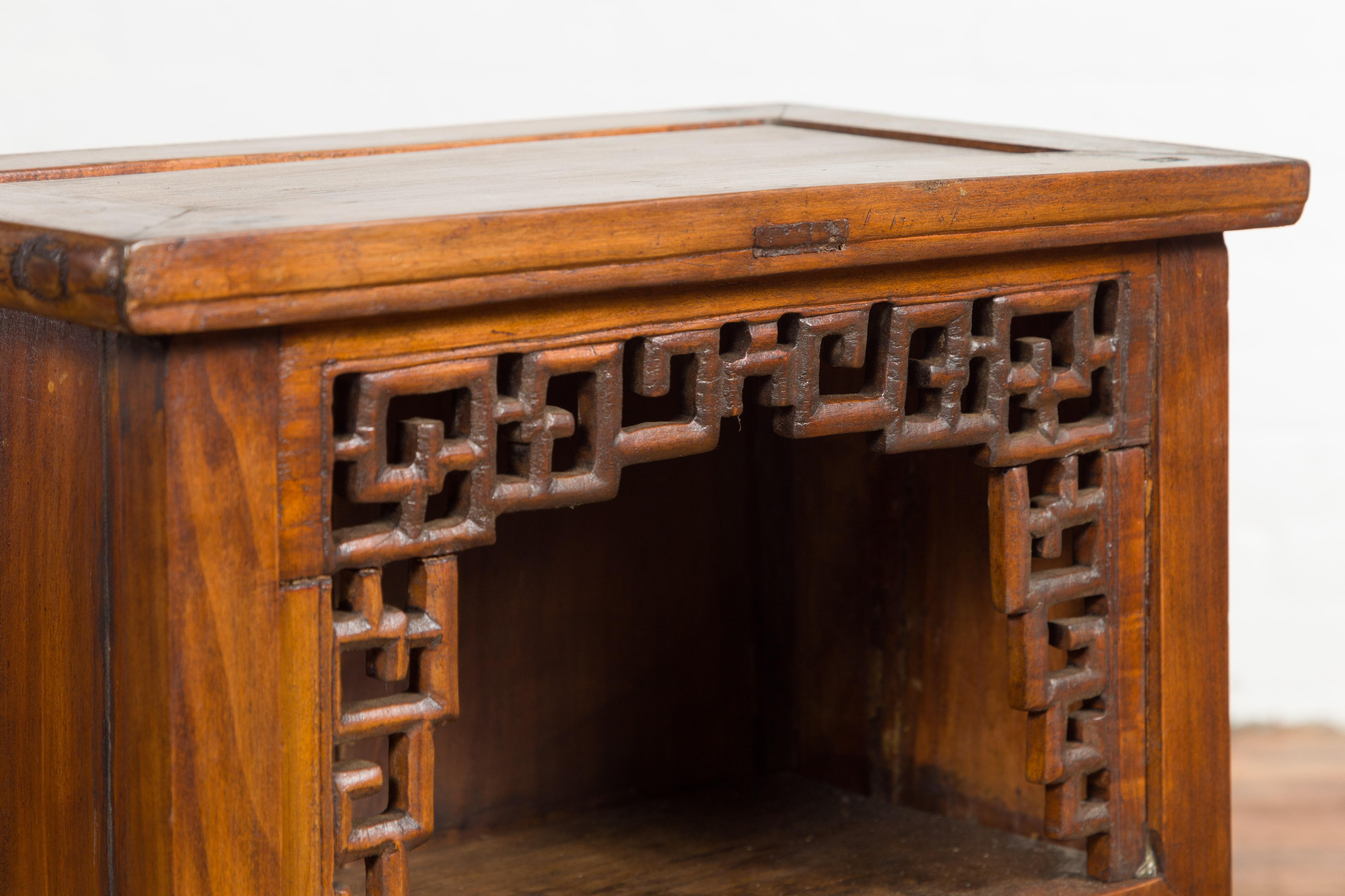 Chinese Qing Dynasty 19th Century Elm Side Cabinet with Fretwork Shelf and Doors For Sale 11