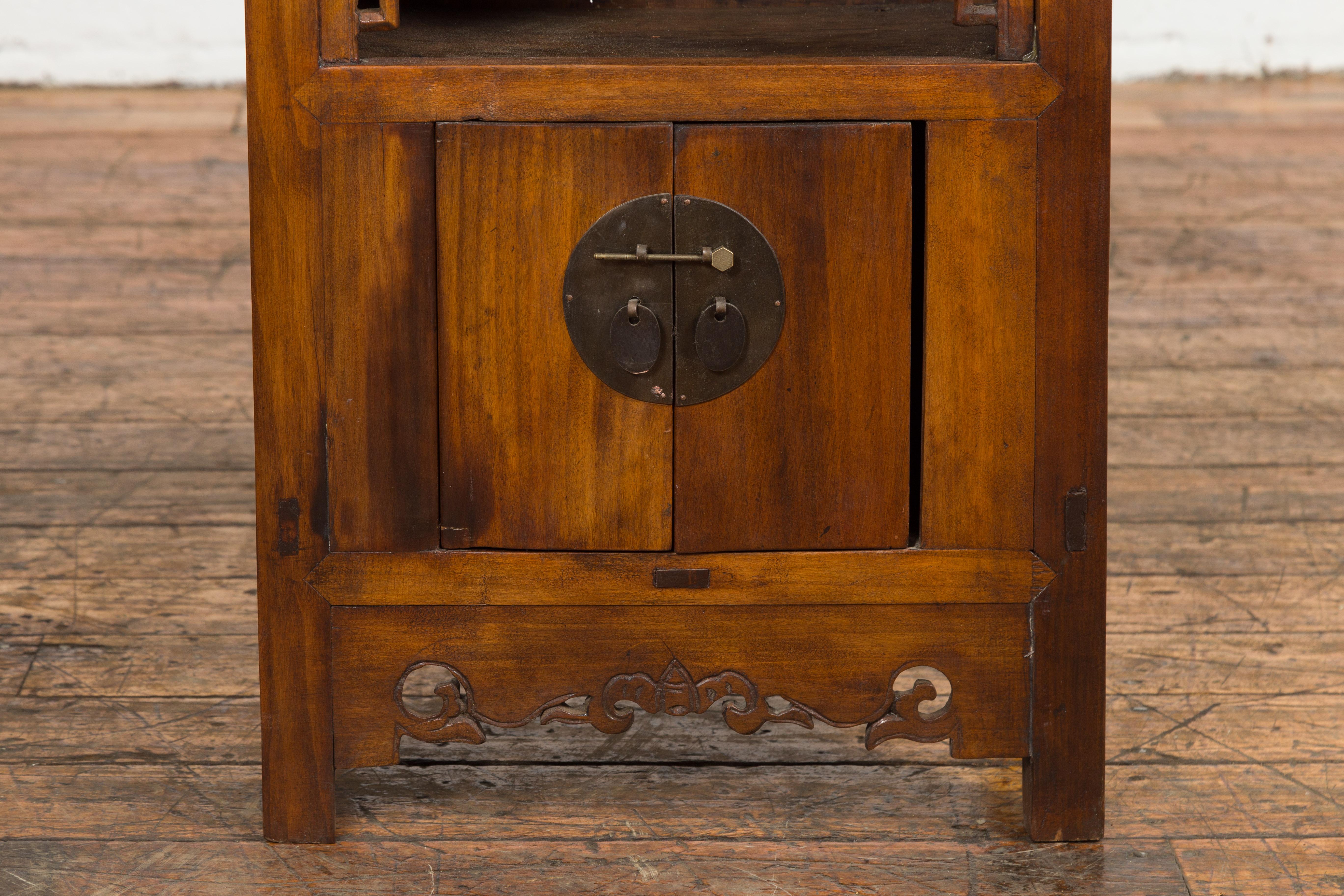 Chinese Qing Dynasty 19th Century Elm Side Cabinet with Fretwork Shelf and Doors For Sale 1