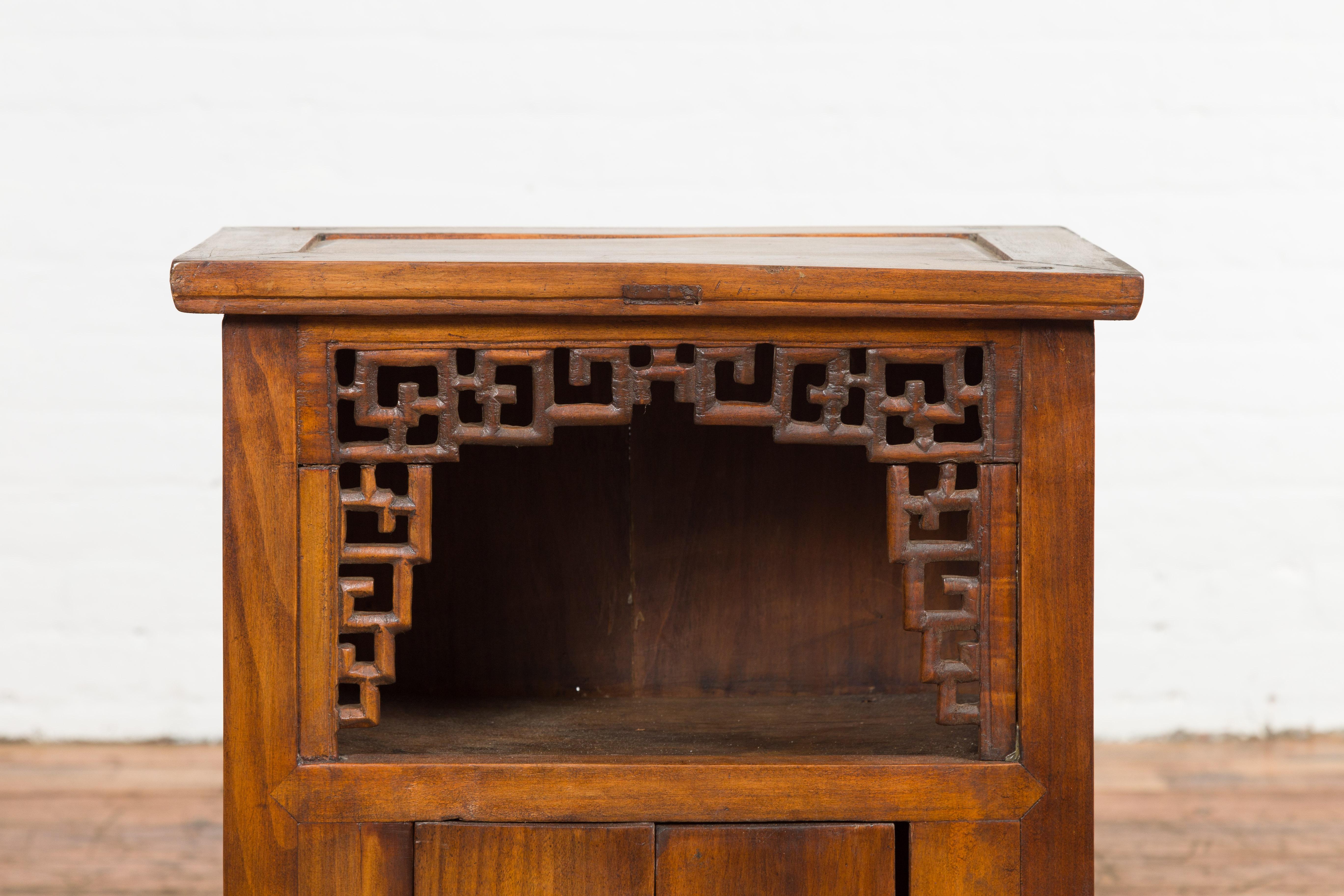 Chinese Qing Dynasty 19th Century Elm Side Cabinet with Fretwork Shelf and Doors For Sale 2