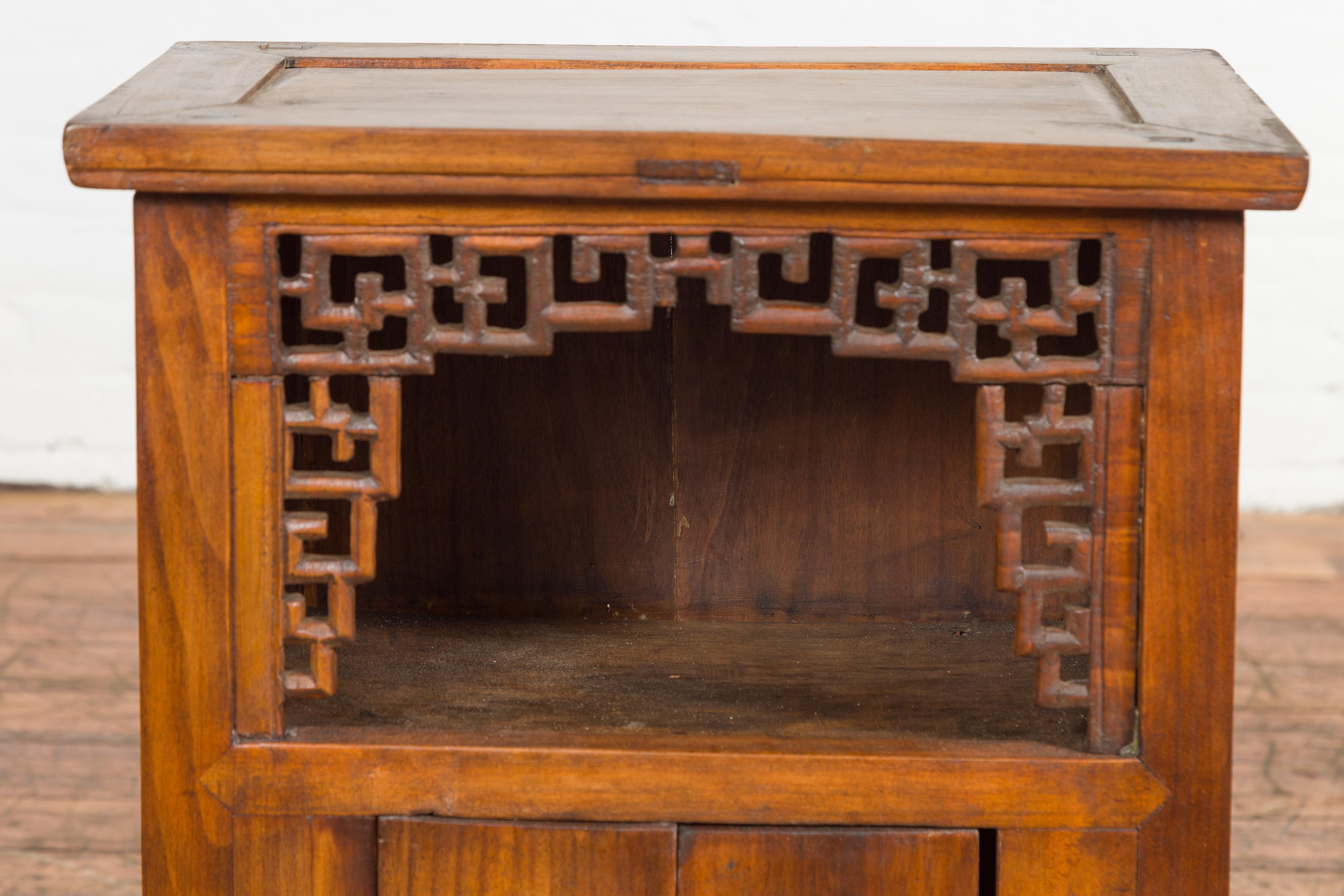 Chinese Qing Dynasty 19th Century Elm Side Cabinet with Fretwork Shelf and Doors For Sale 4