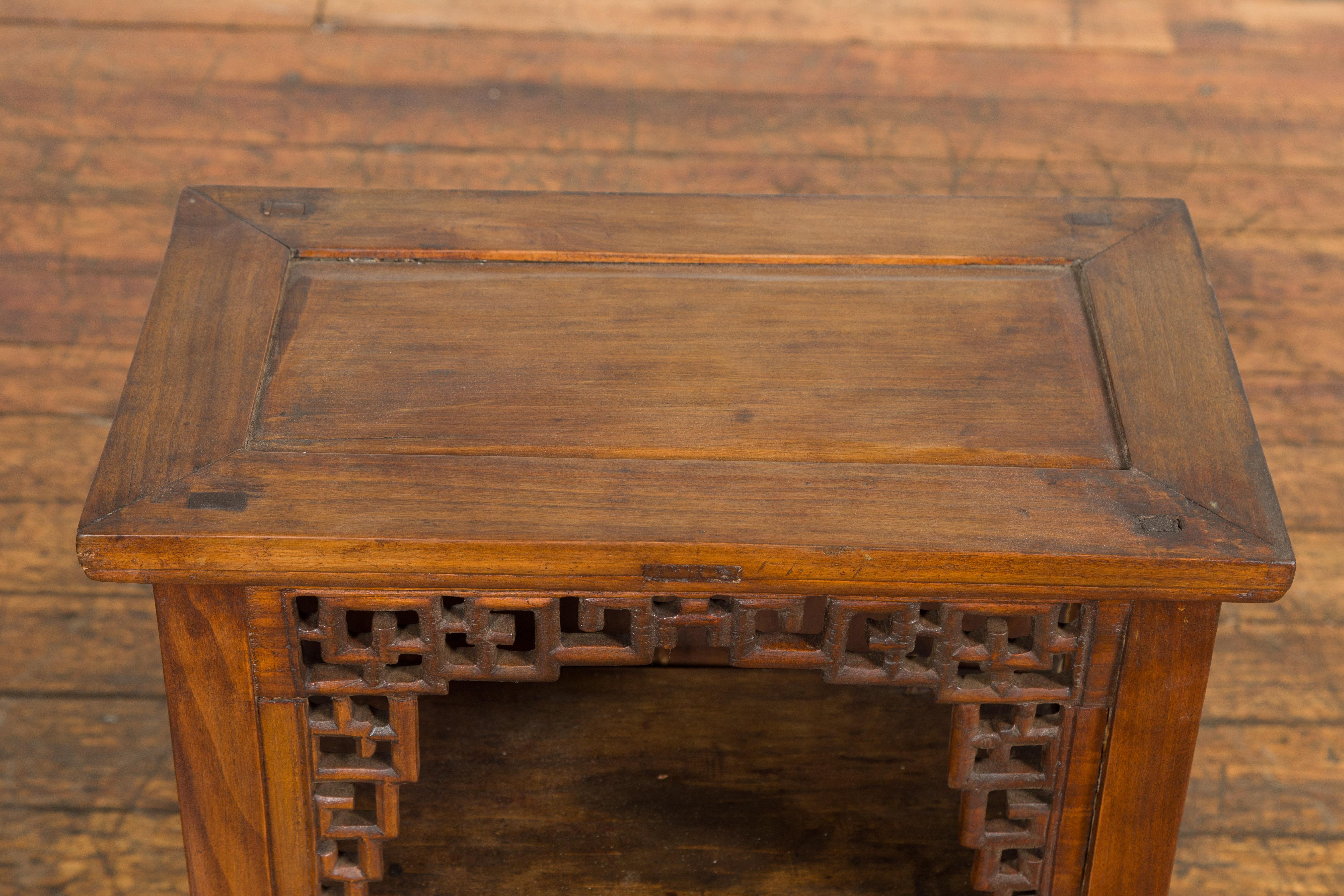 Chinese Qing Dynasty 19th Century Elm Side Cabinet with Fretwork Shelf and Doors For Sale 5