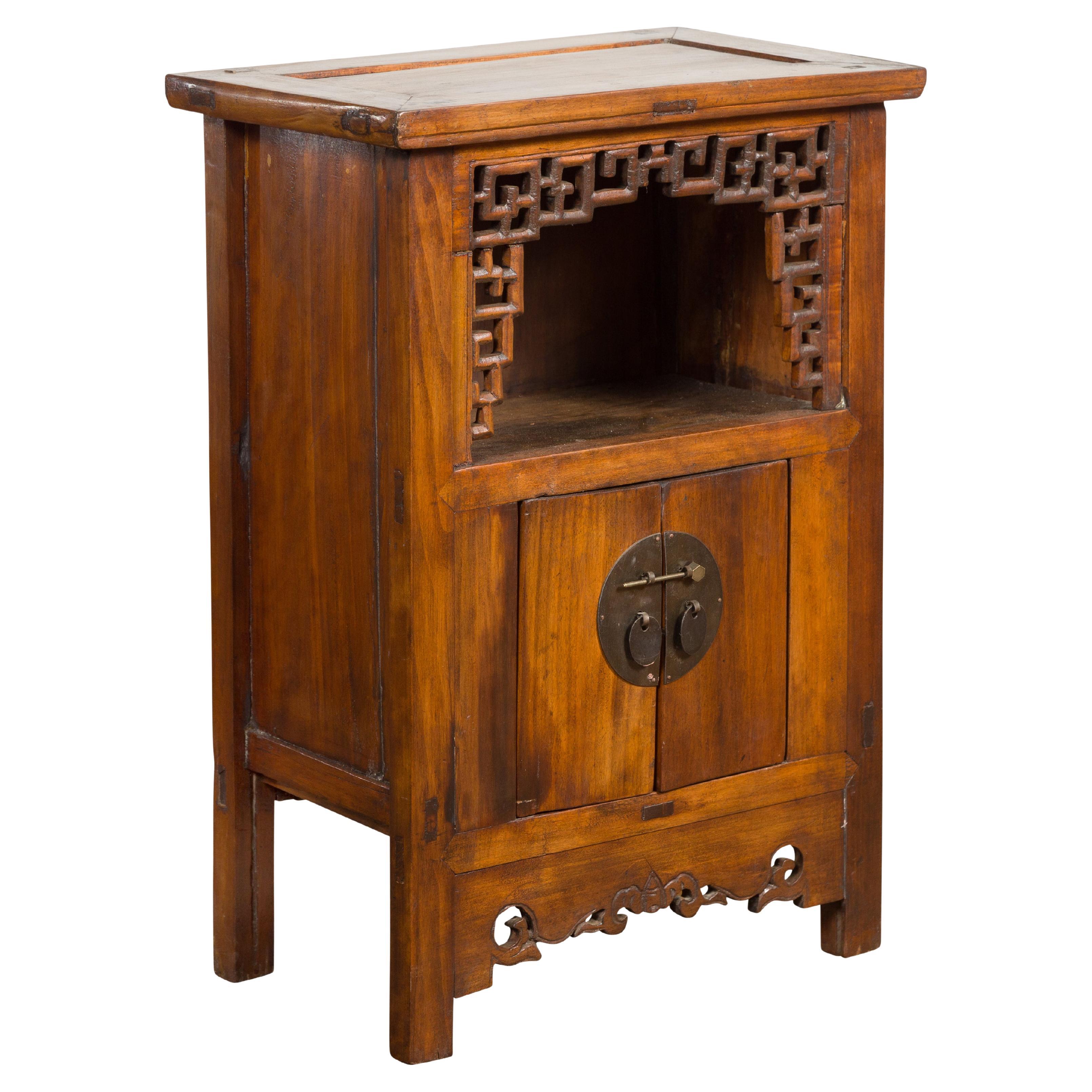 Chinese Qing Dynasty 19th Century Elm Side Cabinet with Fretwork Shelf and Doors For Sale