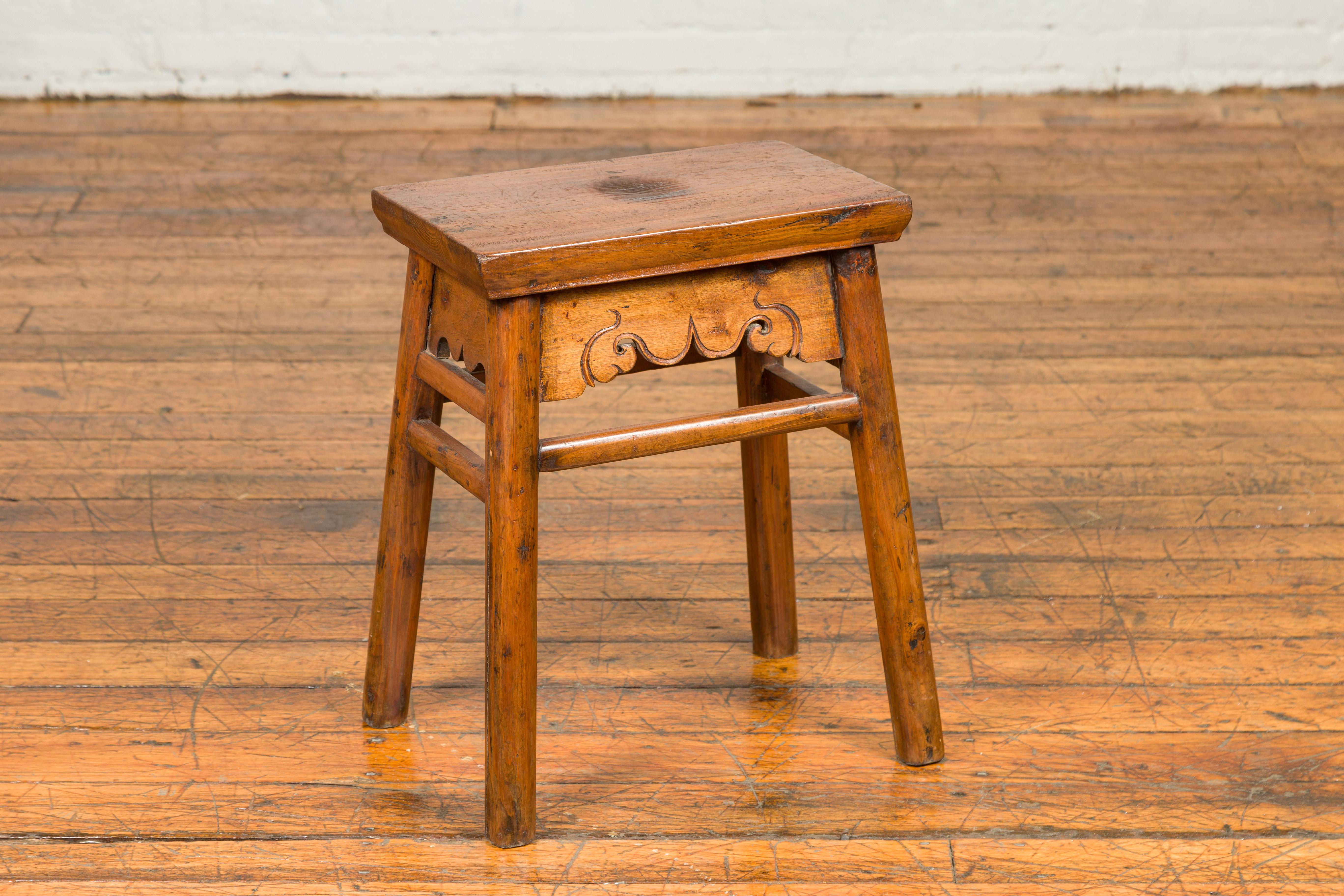 Chinese Qing Dynasty 19th Century Elm Stool with Carved Apron and Stretchers 1