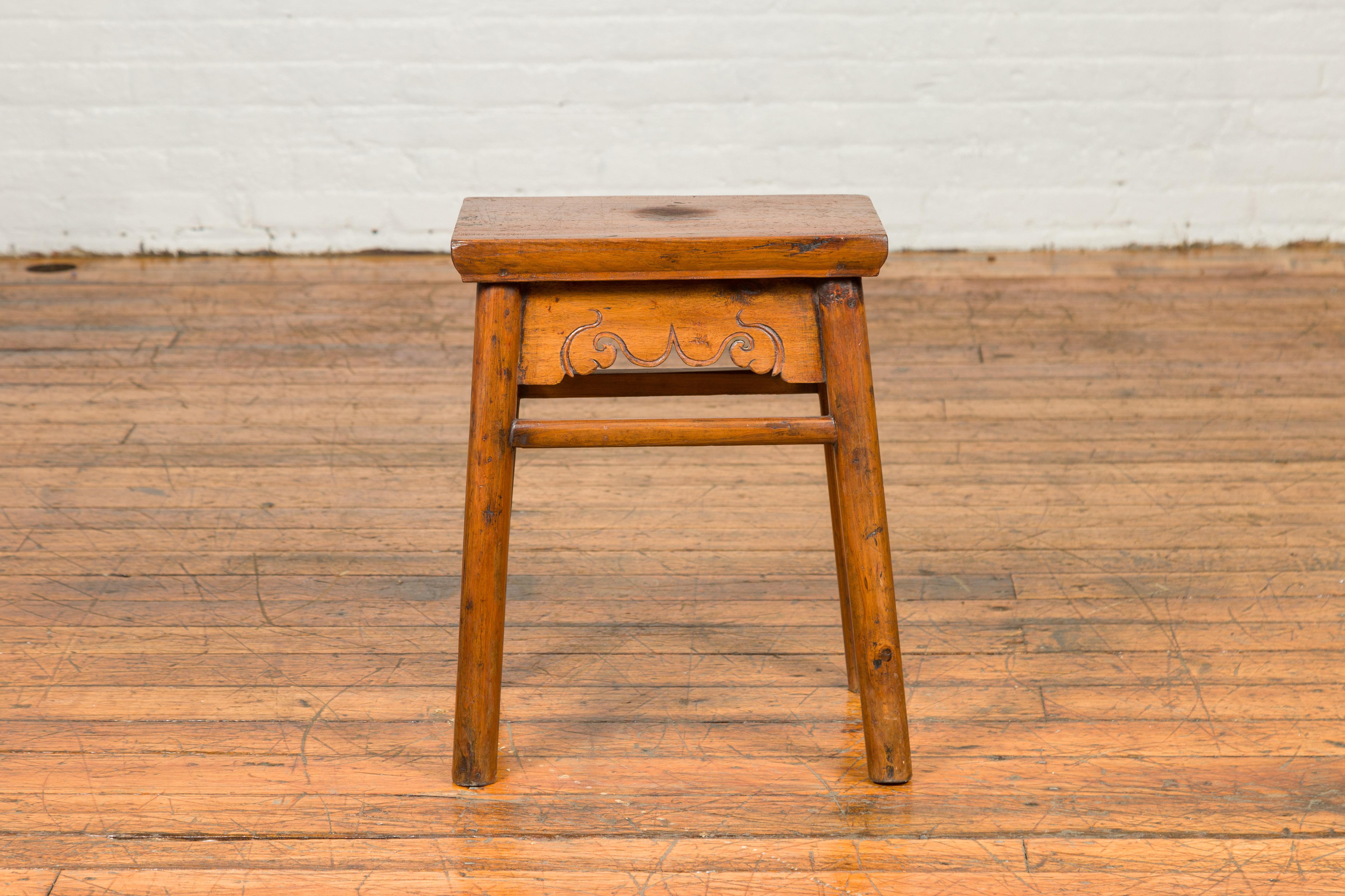 Chinese Qing Dynasty 19th Century Elm Stool with Carved Apron and Stretchers 2