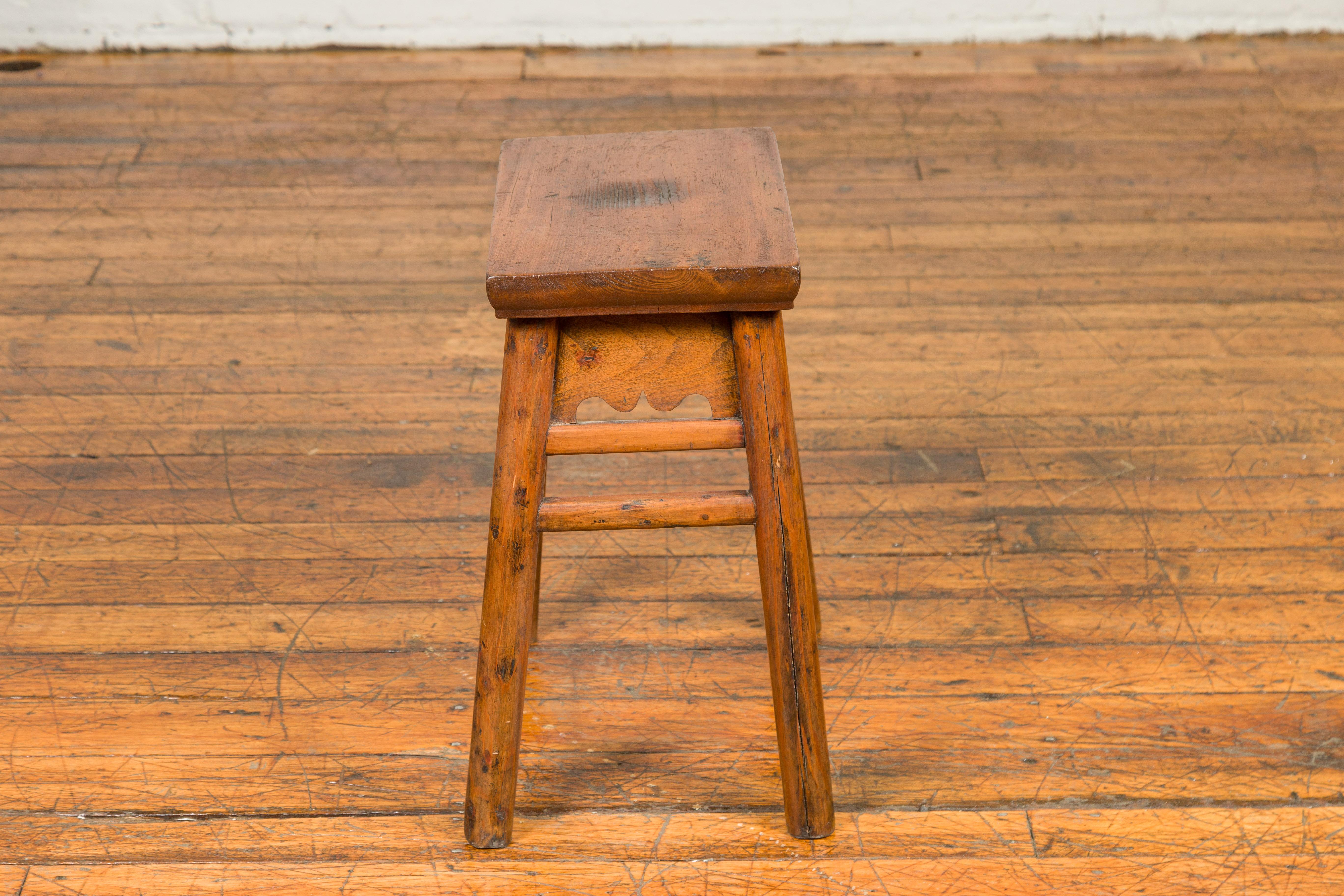 Chinese Qing Dynasty 19th Century Elm Stool with Carved Apron and Stretchers 3