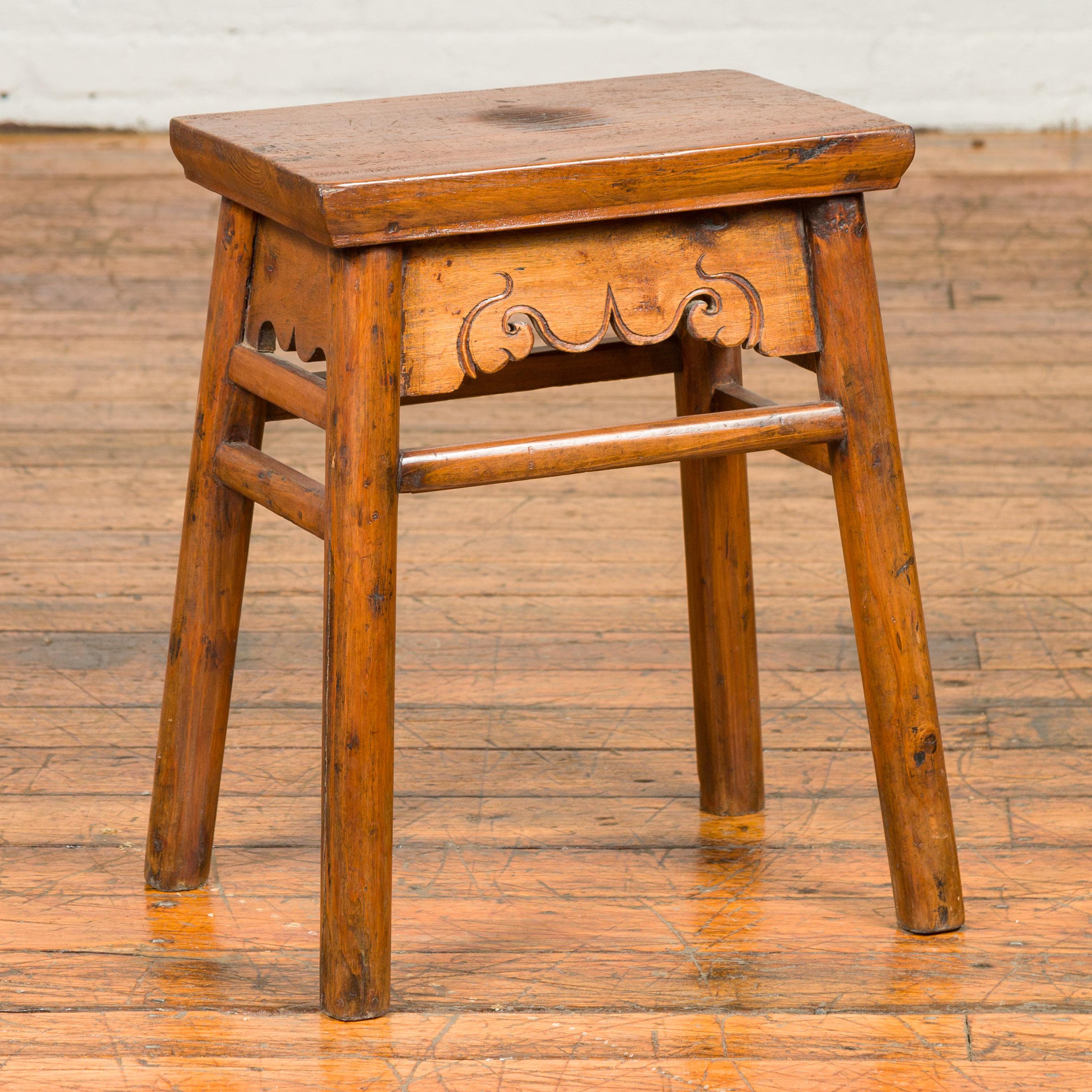 Chinese Qing Dynasty 19th Century Elm Stool with Carved Apron and Stretchers 4