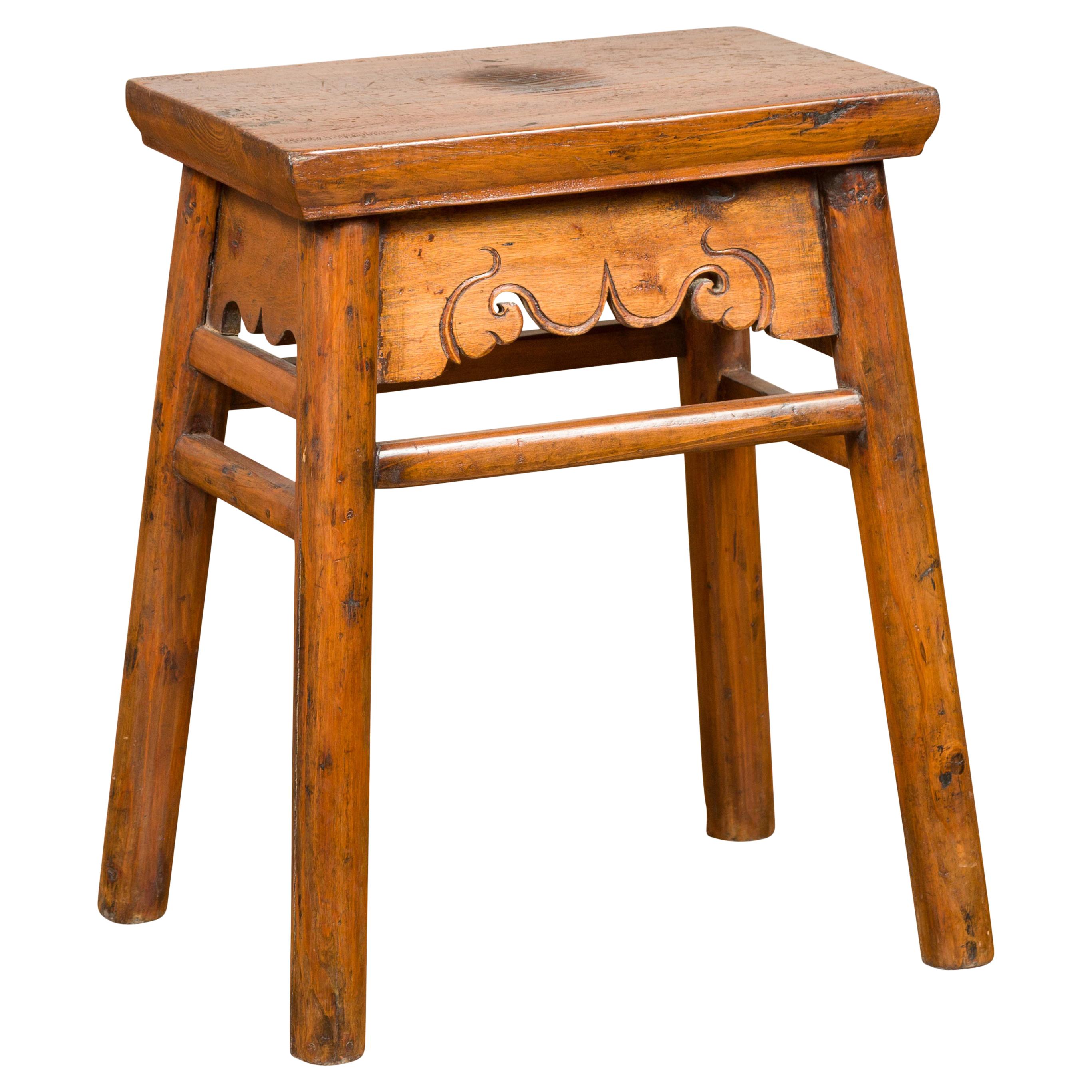 Chinese Qing Dynasty 19th Century Elm Stool with Carved Apron and Stretchers