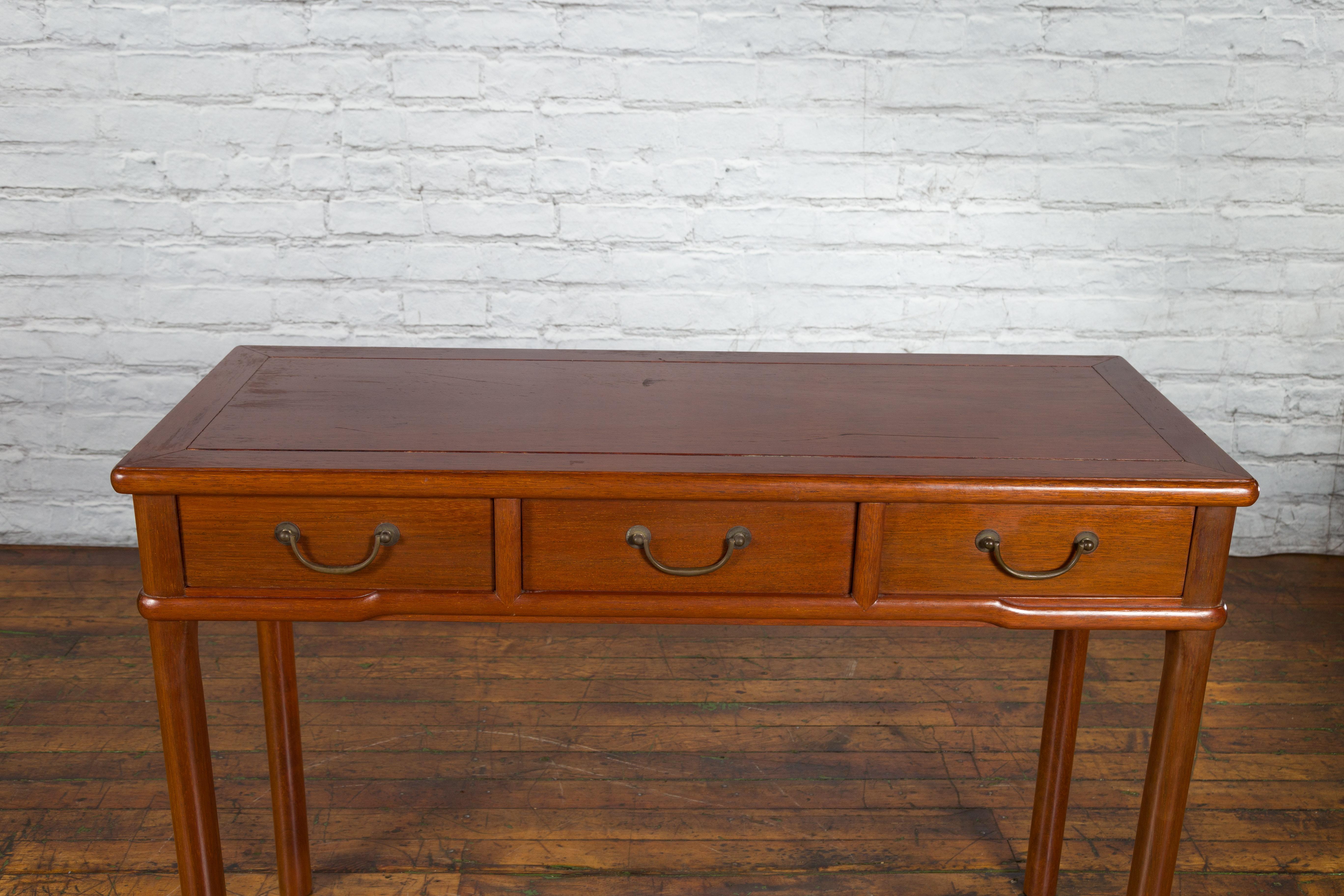 Chinese Qing Dynasty 19th Century Elm Three Drawer Desk with Cylindrical Legs 7