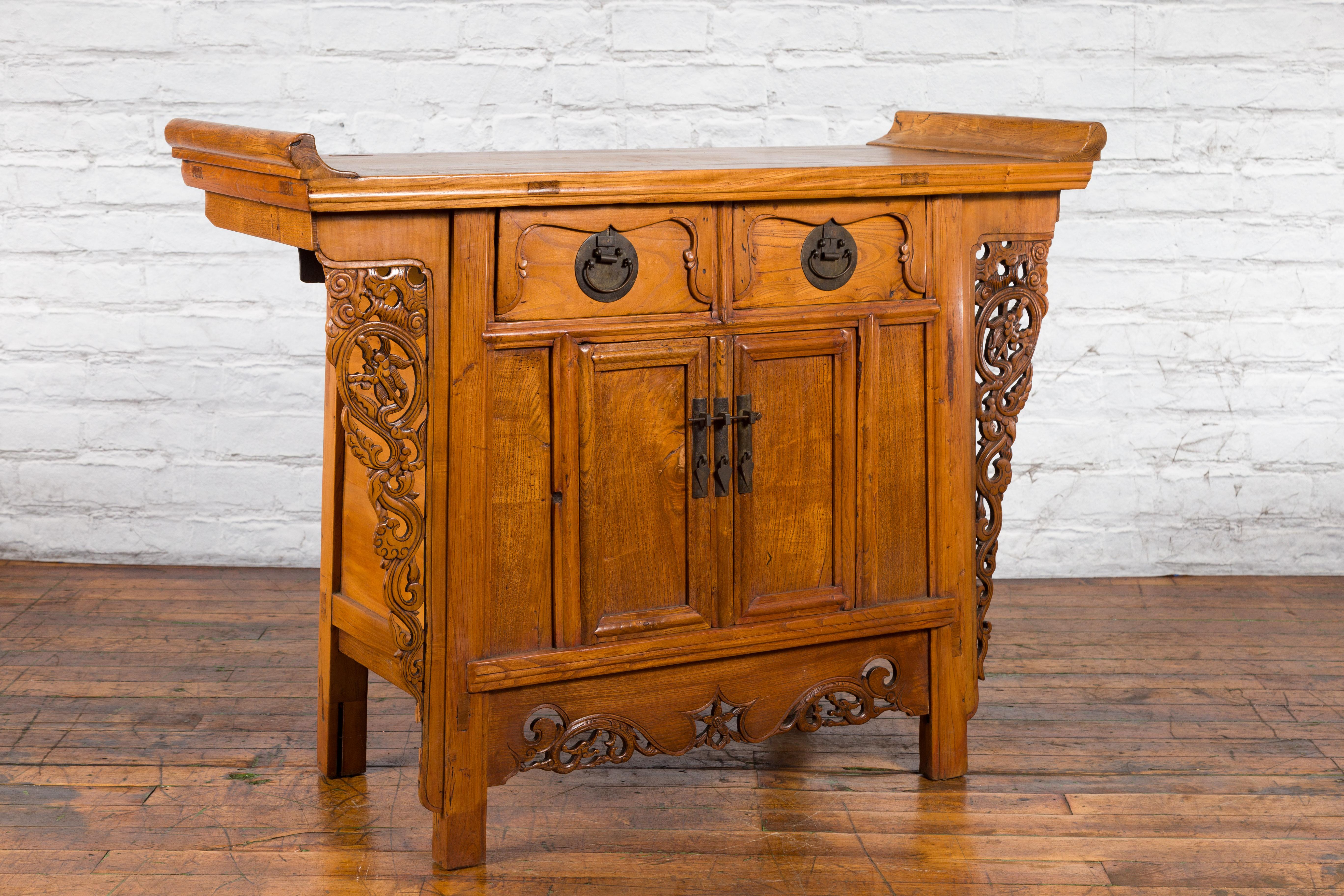 Chinese Qing Dynasty 19th Century Elmwood Altar Cabinet with Carved Spandrels 14