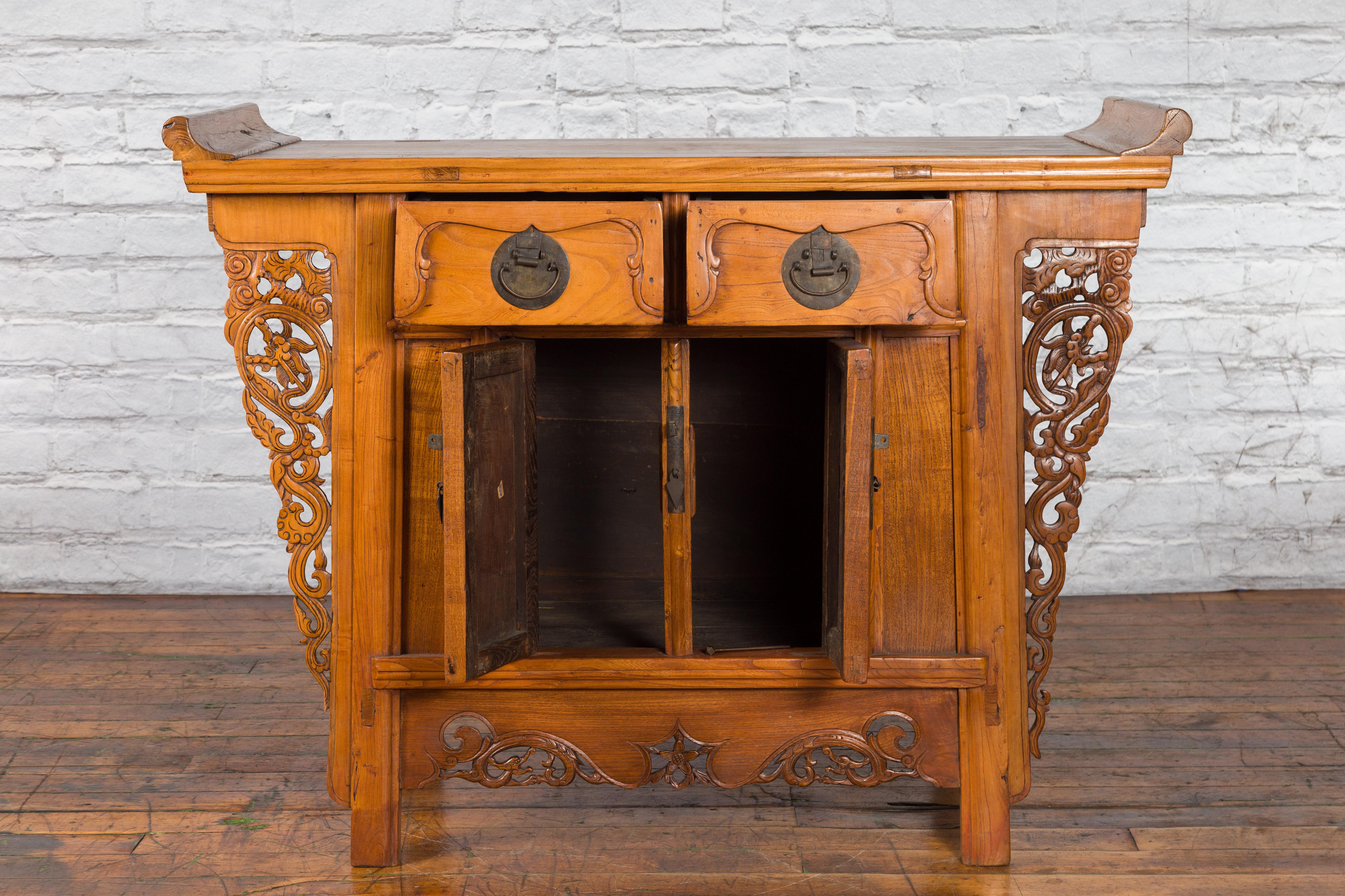 Chinese Qing Dynasty 19th Century Elmwood Altar Cabinet with Carved Spandrels 6