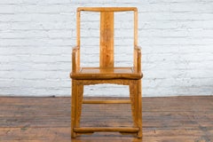 Qing Dynasty 19th Century Elmwood Armchair with Hand-Carved Medallion