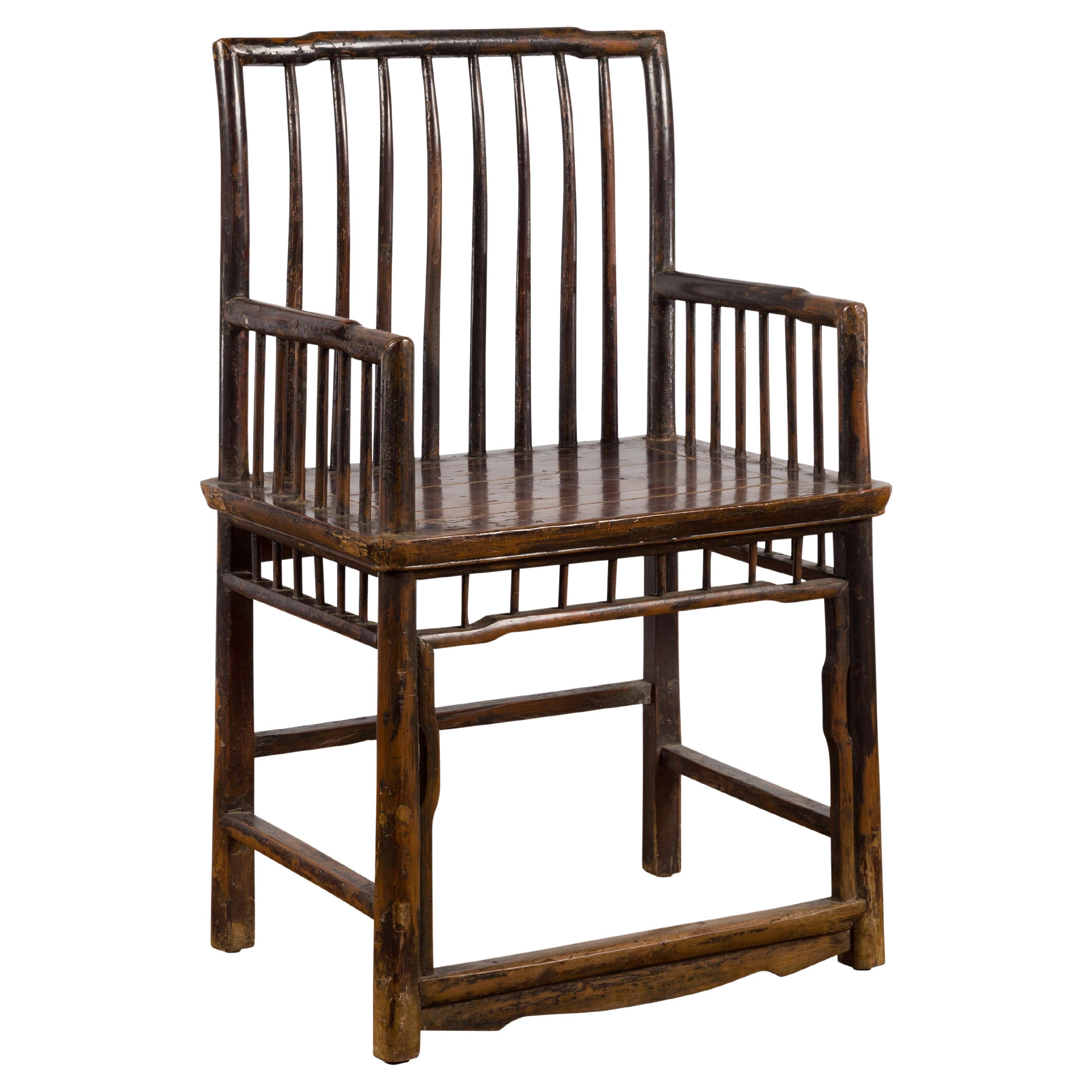 Chinese Qing Dynasty 19th Century Elmwood Armchair with Slatted Back and Arms For Sale