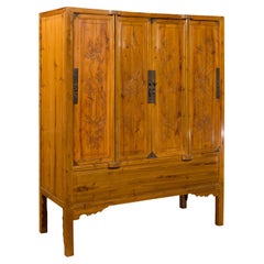 Large Elmwood Four-Door Armoire with Low-Relief Carved Foliage