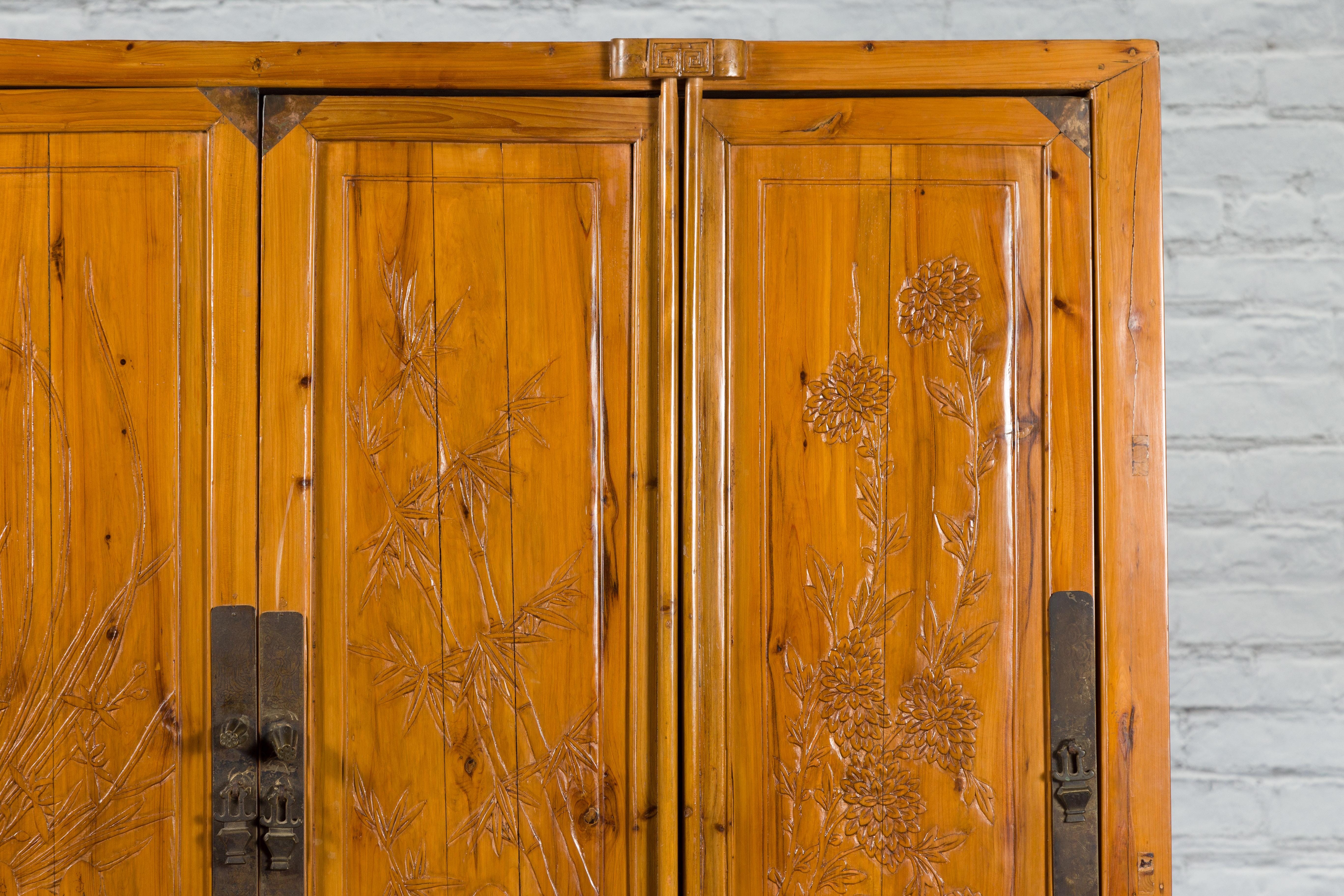 Large Chinese Elmwood Four-Door Armoire with Low-Relief Carved Foliage For Sale 2